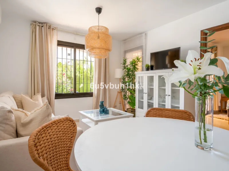 A rare opportunity to own a garden apartment in one of Benalmádena's most sought-after communities, just a short walk from the beach and the vibrant Avenida de las Palmeras.