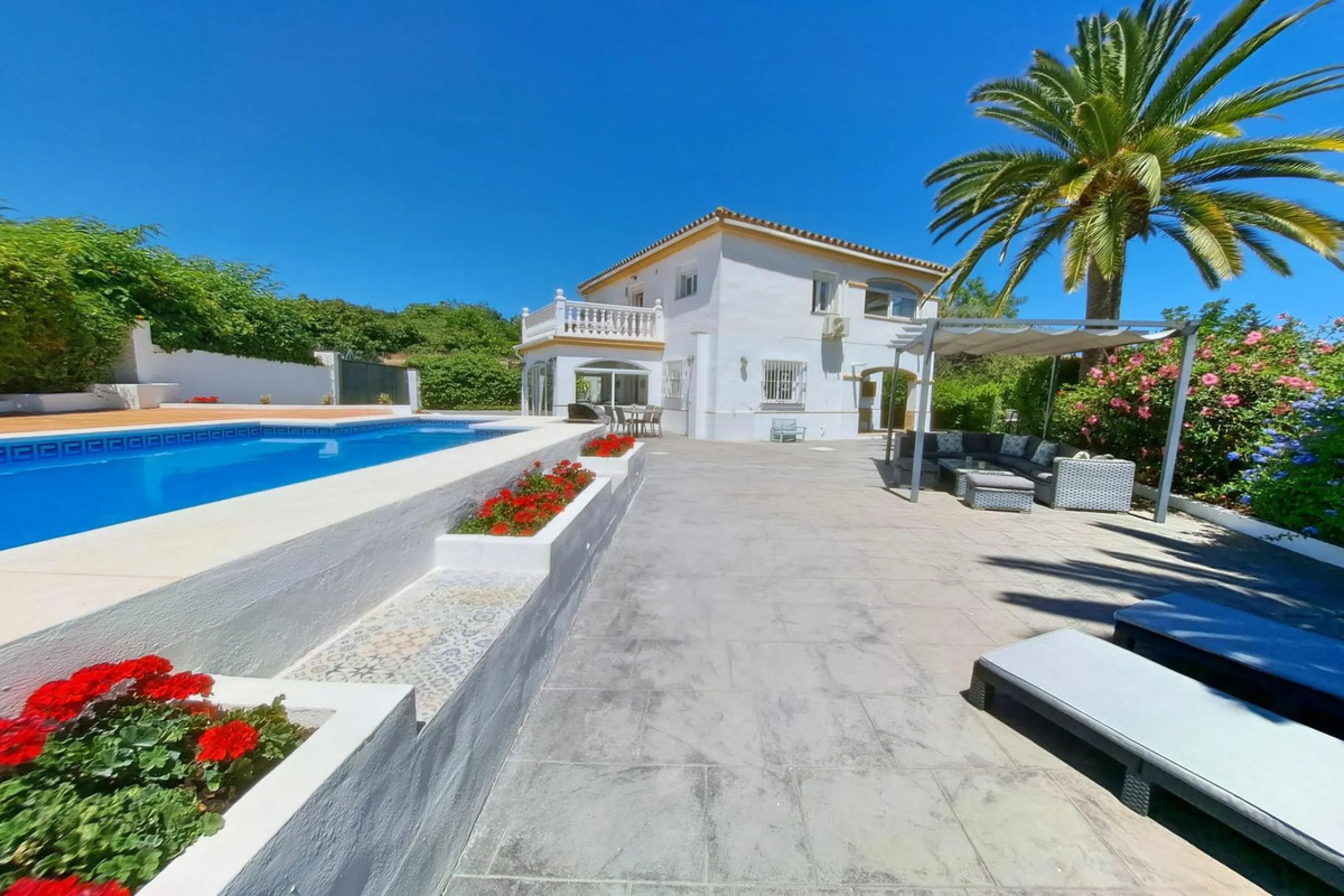 Spectacular detached villa with 3 separate living accommodations, situated in an extremely private location, walking distance to town.
