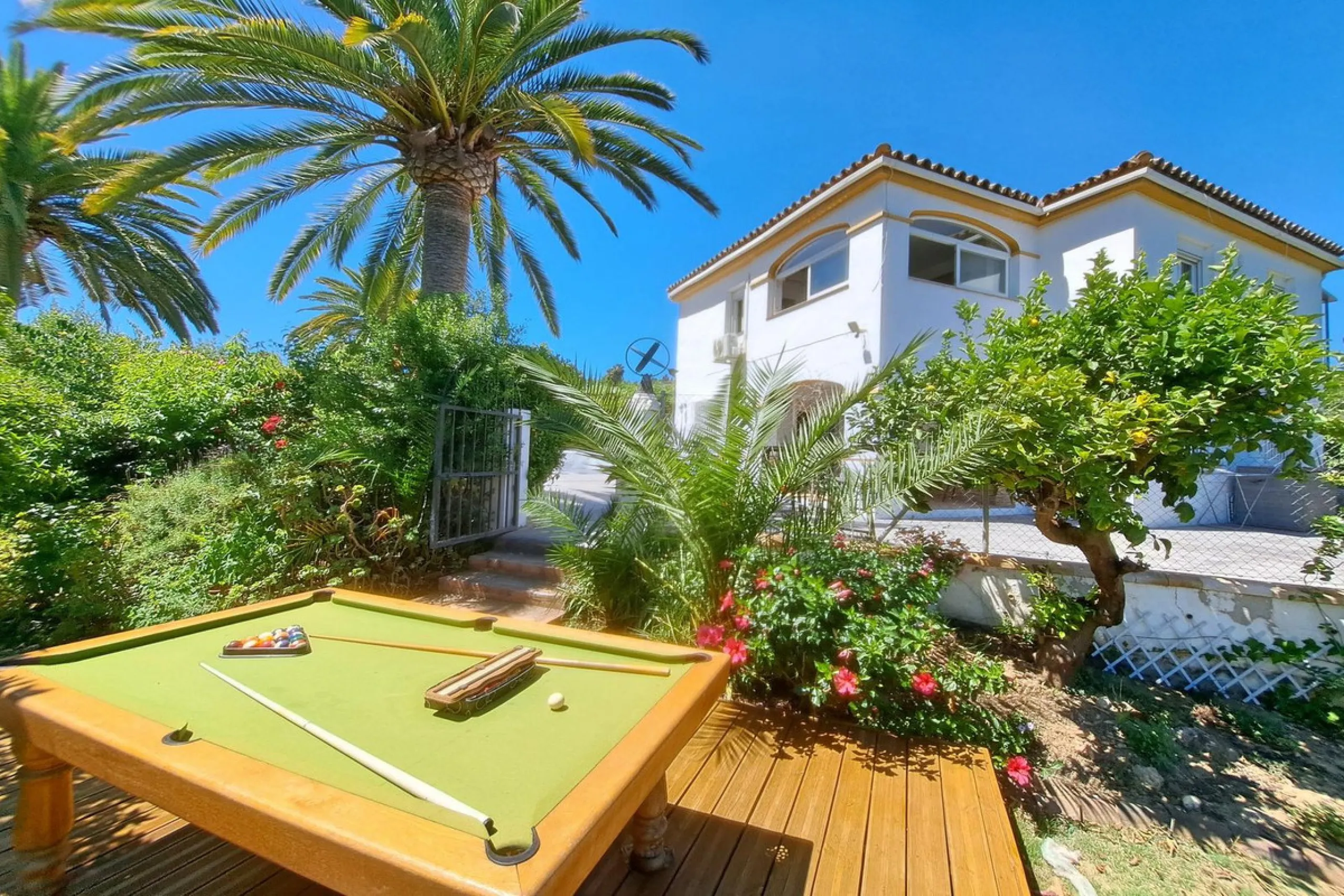 Spectacular detached villa with 3 separate living accommodations, situated in an extremely private location, walking distance to town.