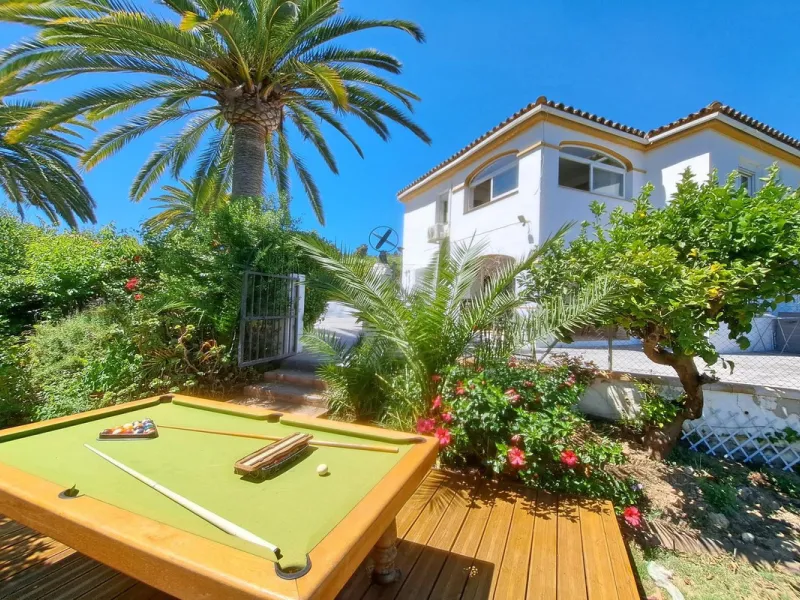 Spectacular detached villa with 3 separate living accommodations, situated in an extremely private location, walking distance to town.