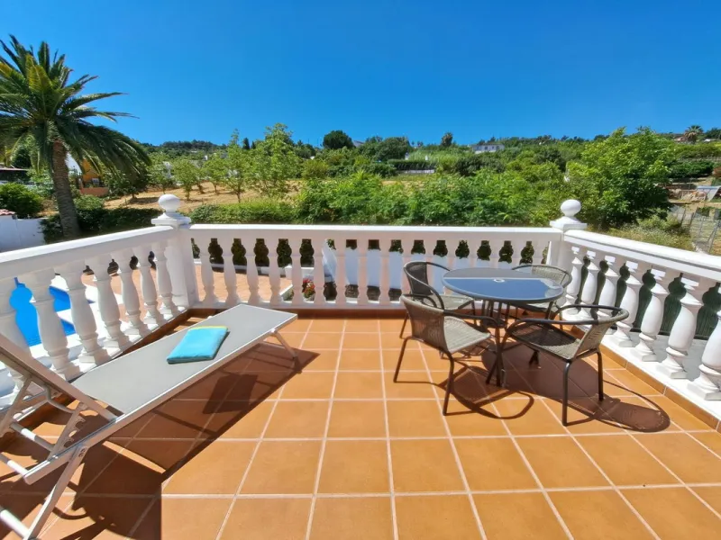 Spectacular detached villa with 3 separate living accommodations, situated in an extremely private location, walking distance to town.