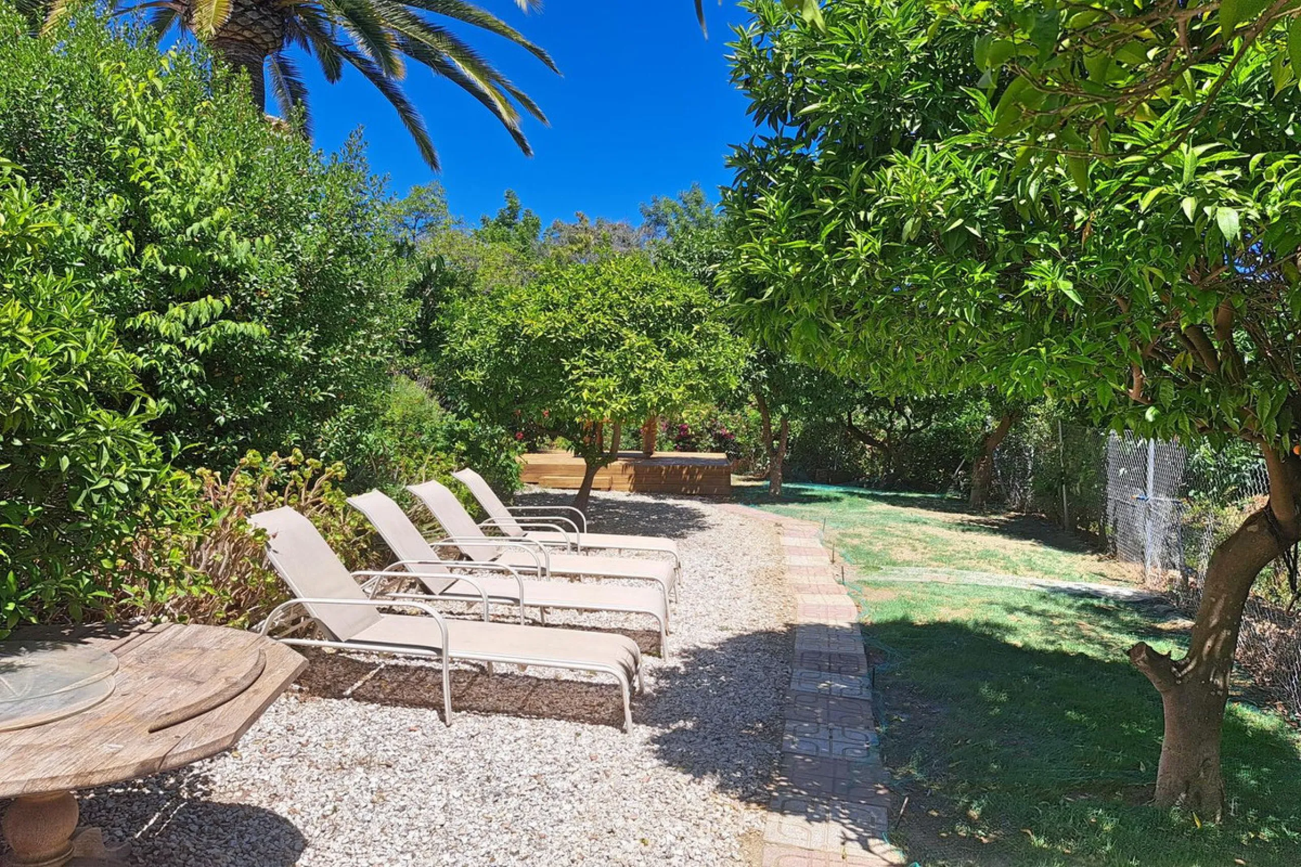 Spectacular detached villa with 3 separate living accommodations, situated in an extremely private location, walking distance to town.