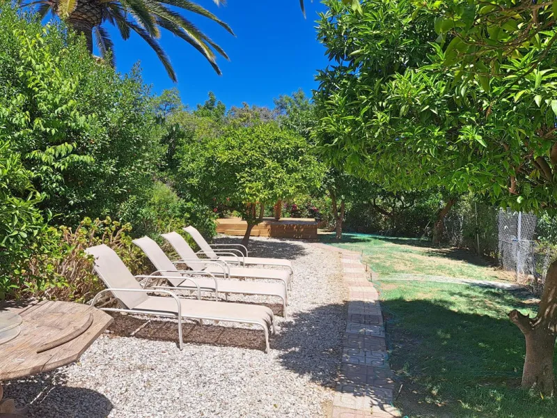 Spectacular detached villa with 3 separate living accommodations, situated in an extremely private location, walking distance to town.