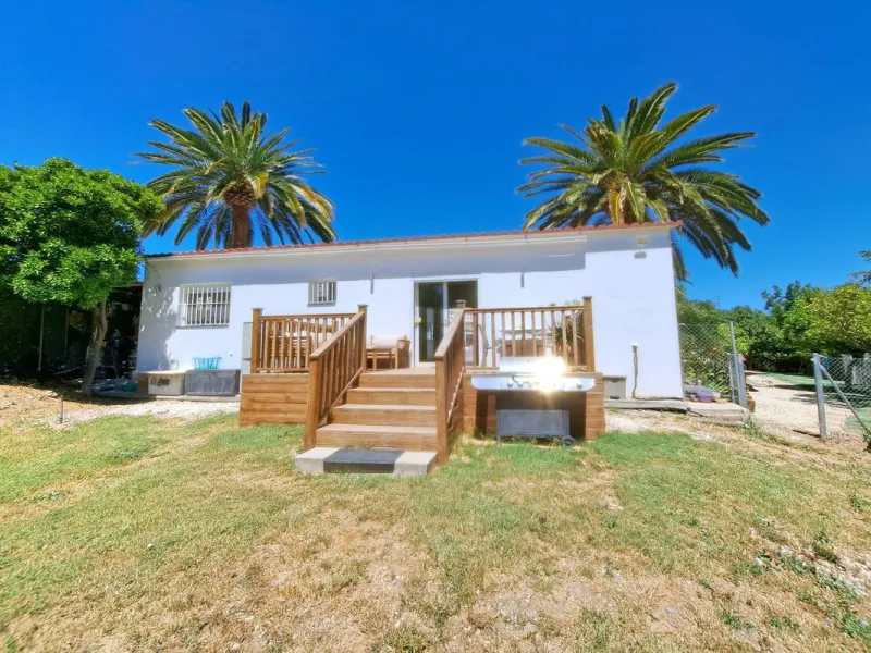 Spectacular detached villa with 3 separate living accommodations, situated in an extremely private location, walking distance to town.