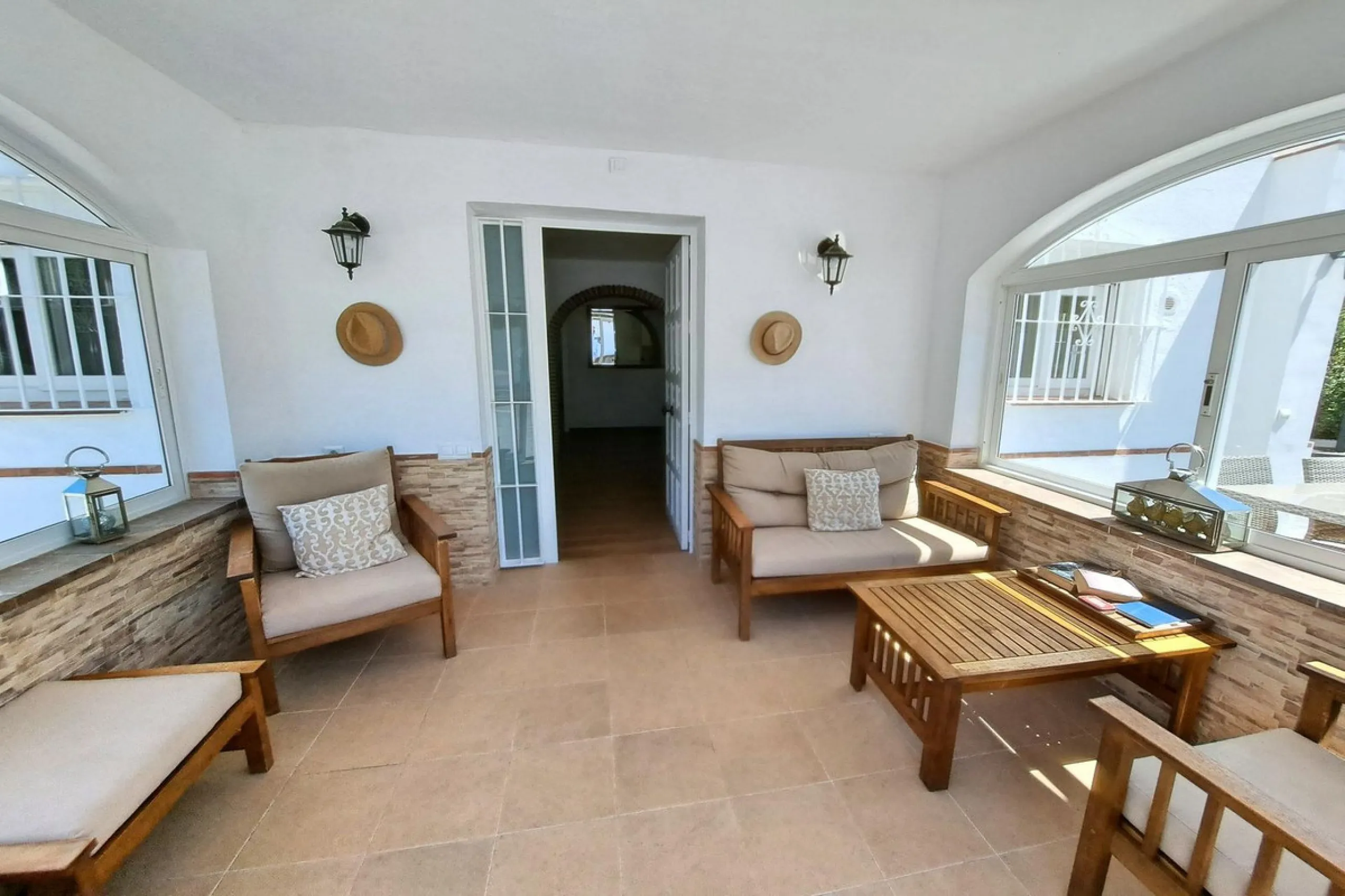 Spectacular detached villa with 3 separate living accommodations, situated in an extremely private location, walking distance to town.