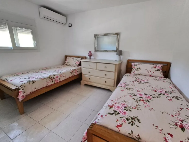 Spectacular detached villa with 3 separate living accommodations, situated in an extremely private location, walking distance to town.