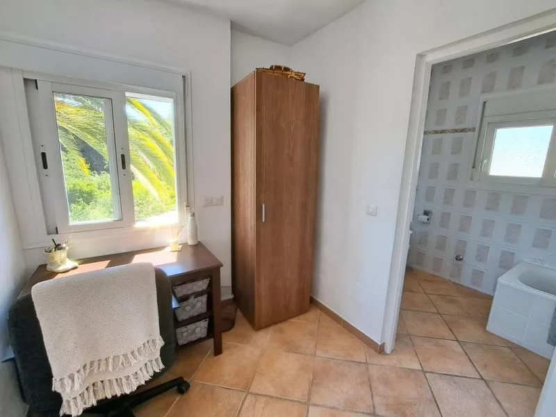 Spectacular detached villa with 3 separate living accommodations, situated in an extremely private location, walking distance to town.