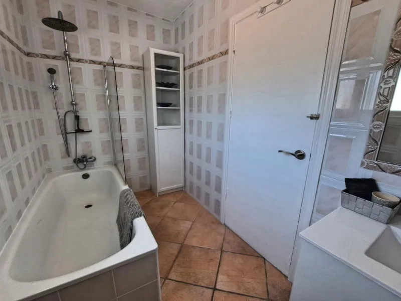 Spectacular detached villa with 3 separate living accommodations, situated in an extremely private location, walking distance to town.
