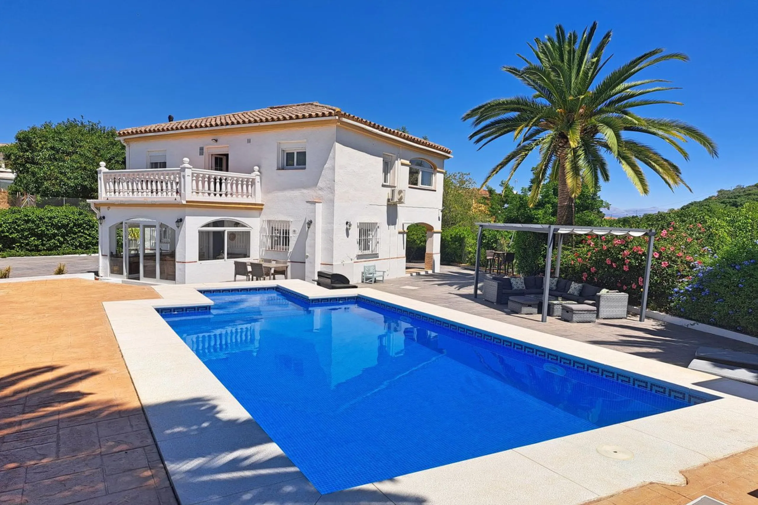 Spectacular detached villa with 3 separate living accommodations, situated in an extremely private location, walking distance to town.