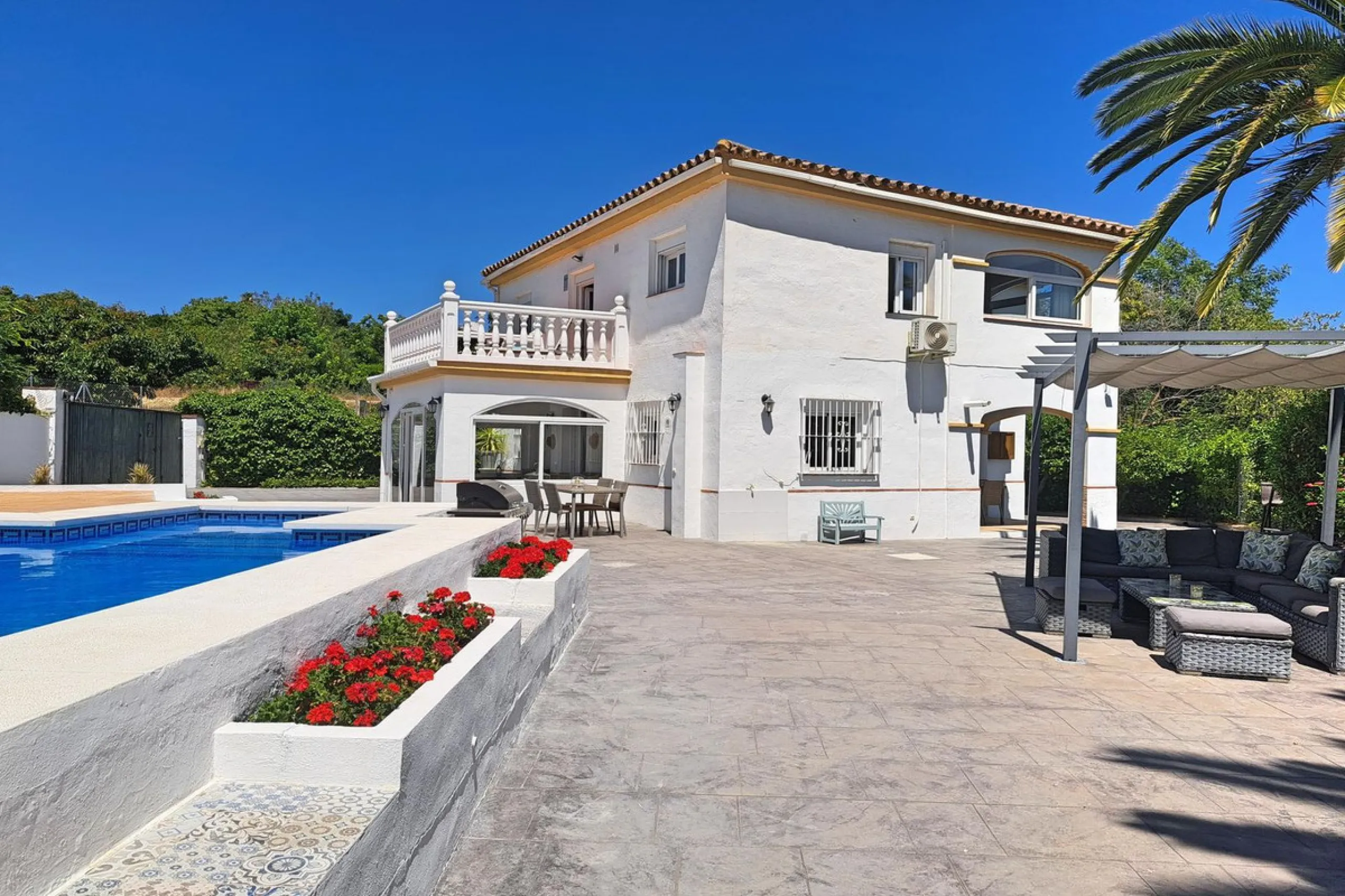 Spectacular detached villa with 3 separate living accommodations, situated in an extremely private location, walking distance to town.