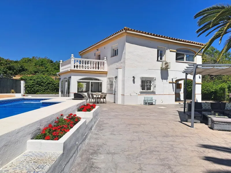 Spectacular detached villa with 3 separate living accommodations, situated in an extremely private location, walking distance to town.
