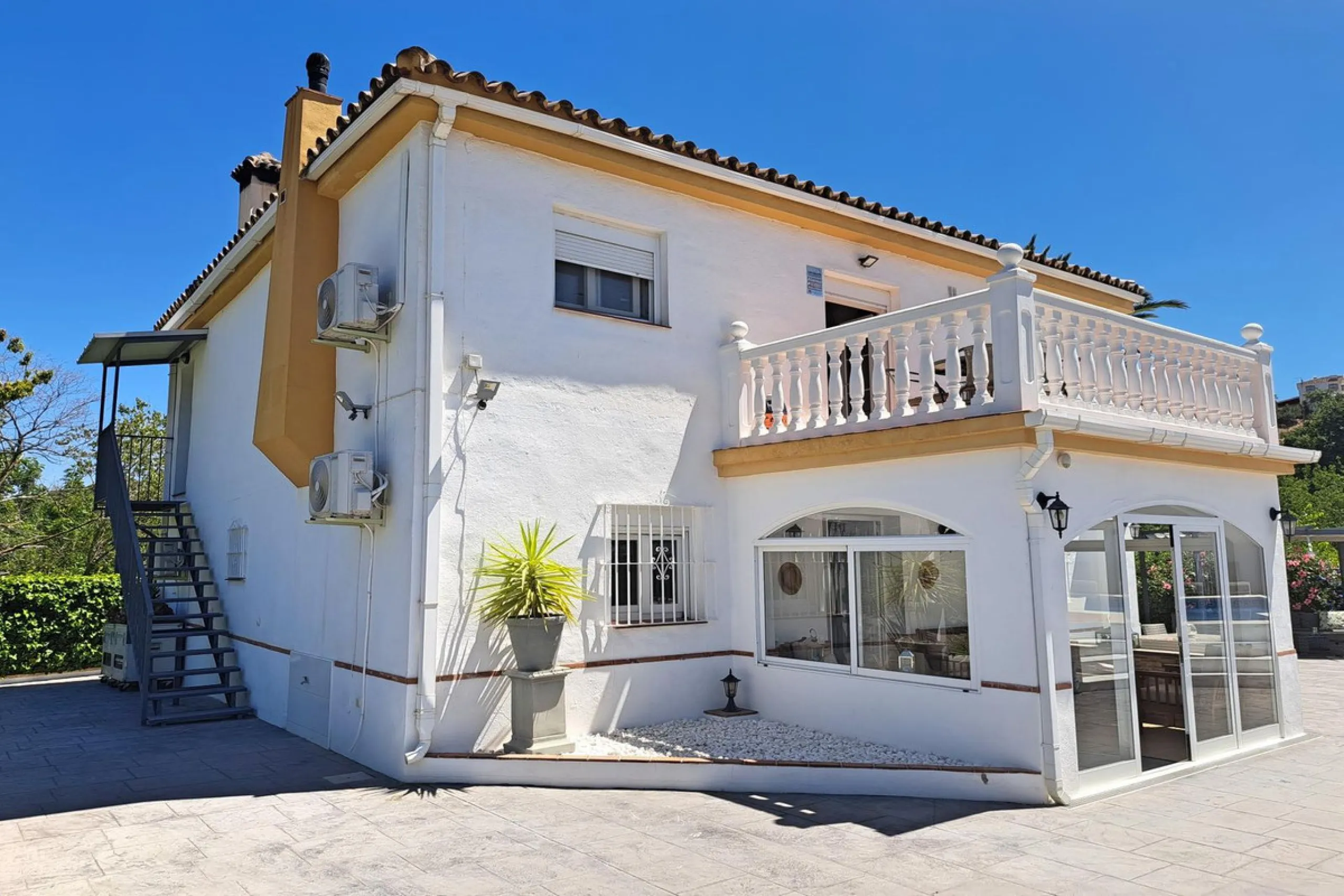 Spectacular detached villa with 3 separate living accommodations, situated in an extremely private location, walking distance to town.
