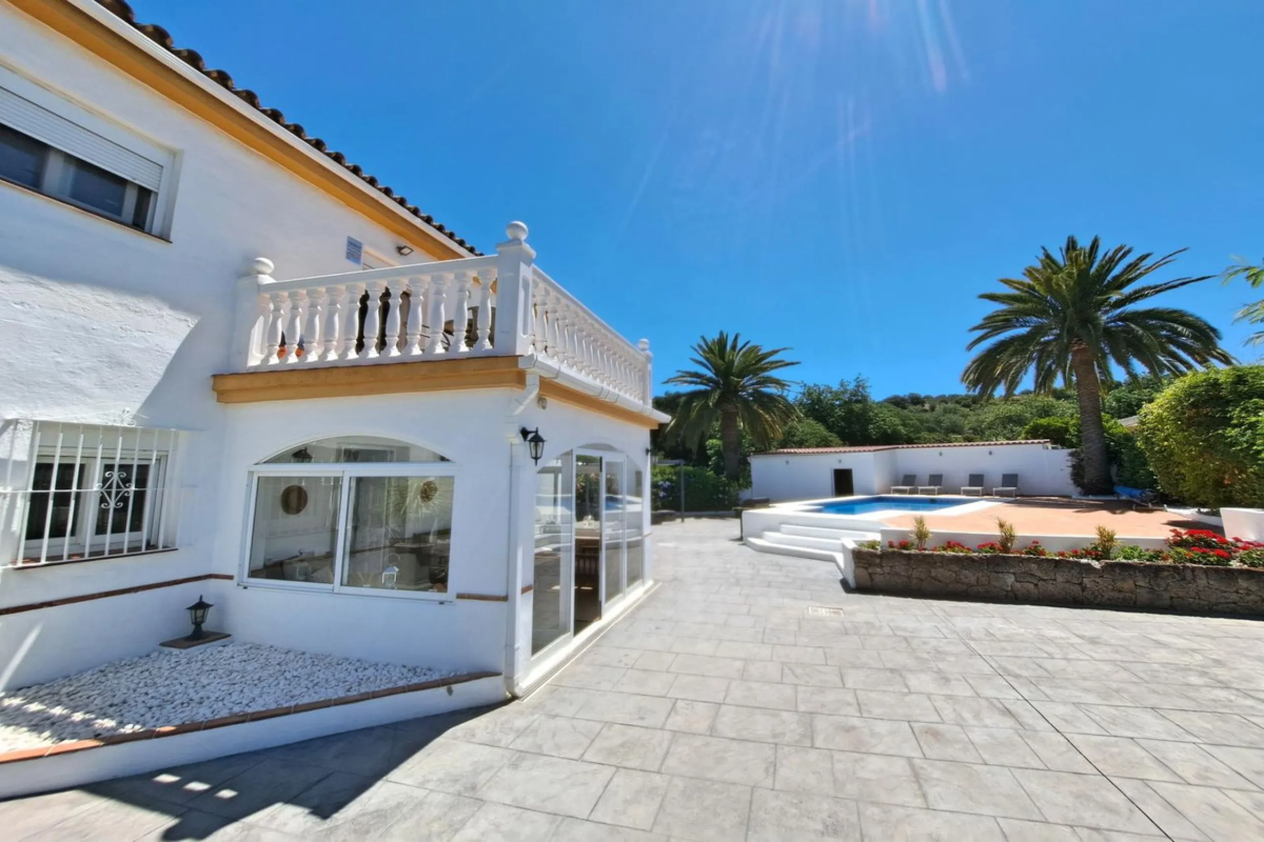 Spectacular detached villa with 3 separate living accommodations, situated in an extremely private location, walking distance to town.