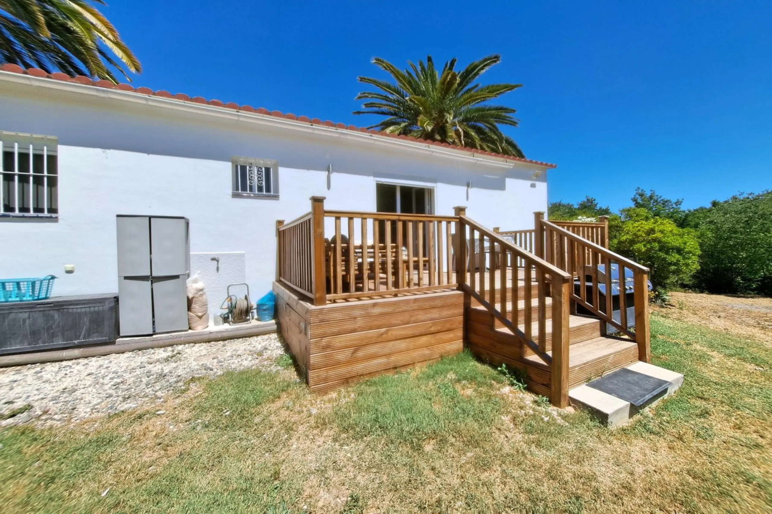Spectacular detached villa with 3 separate living accommodations, situated in an extremely private location, walking distance to town.