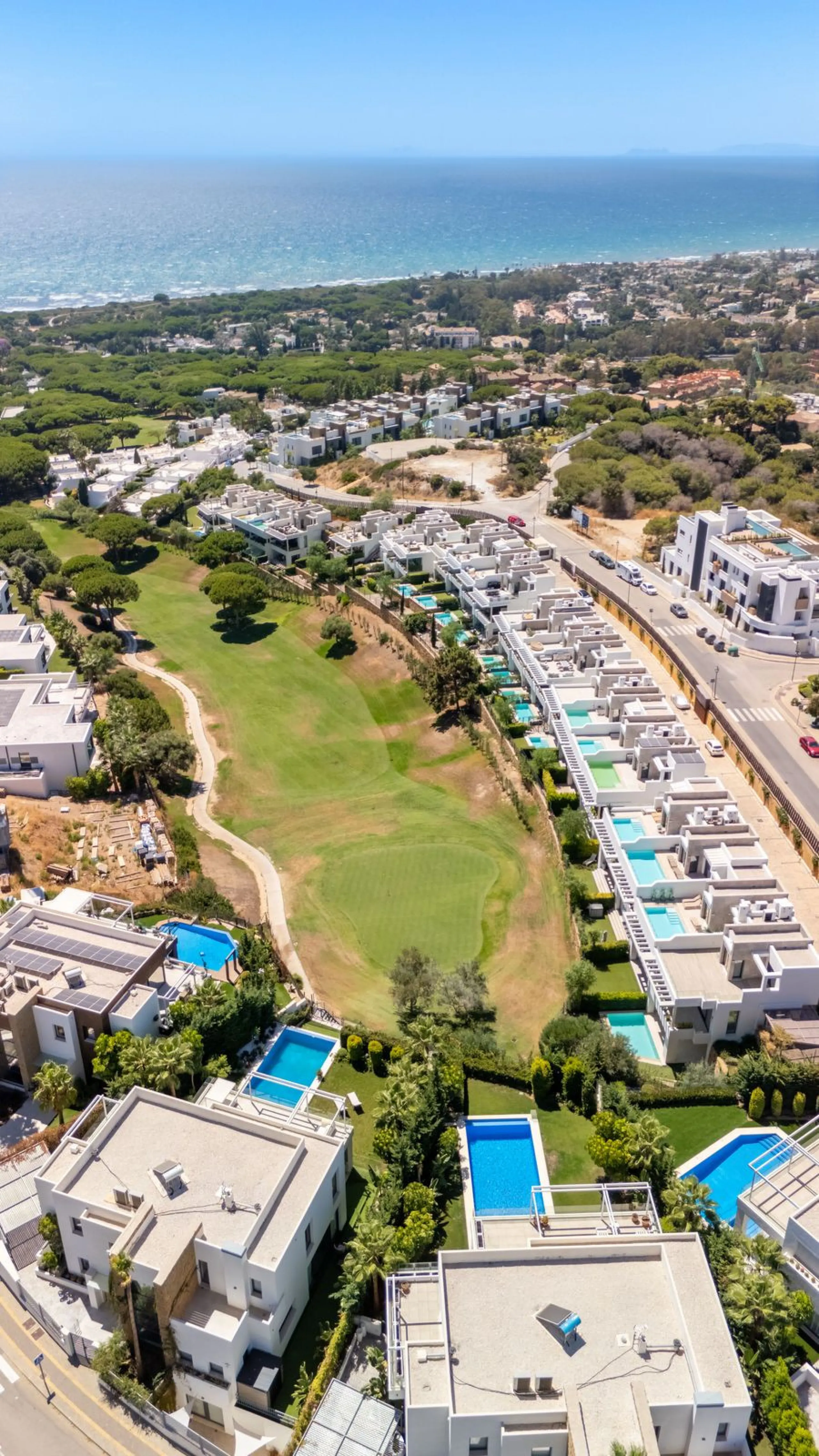 This exceptional luxury villa is situated in the prestigious area of Cabopino, Marbella East, offering a prime front line golf location with captivating views of both the sea and lush fairways. Designed to the highest standards, the property spans a gener