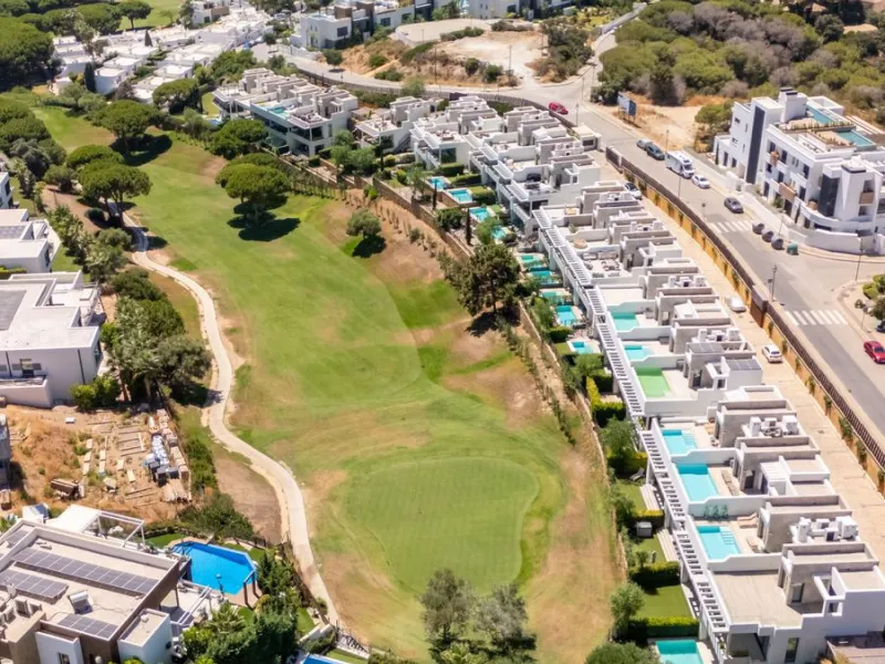 This exceptional luxury villa is situated in the prestigious area of Cabopino, Marbella East, offering a prime front line golf location with captivating views of both the sea and lush fairways. Designed to the highest standards, the property spans a gener