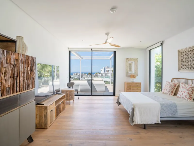 This exceptional luxury villa is situated in the prestigious area of Cabopino, Marbella East, offering a prime front line golf location with captivating views of both the sea and lush fairways. Designed to the highest standards, the property spans a gener