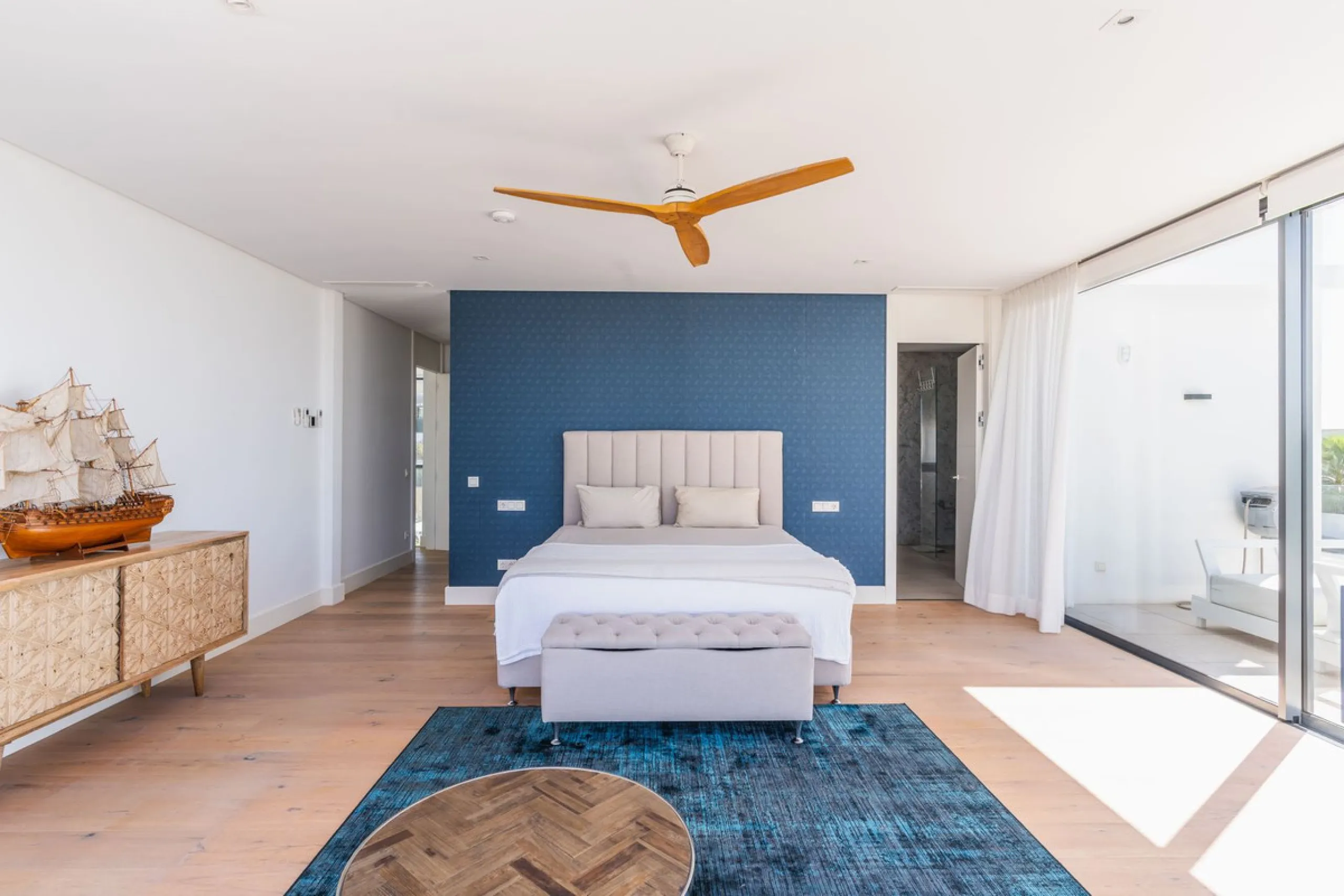 This exceptional luxury villa is situated in the prestigious area of Cabopino, Marbella East, offering a prime front line golf location with captivating views of both the sea and lush fairways. Designed to the highest standards, the property spans a gener