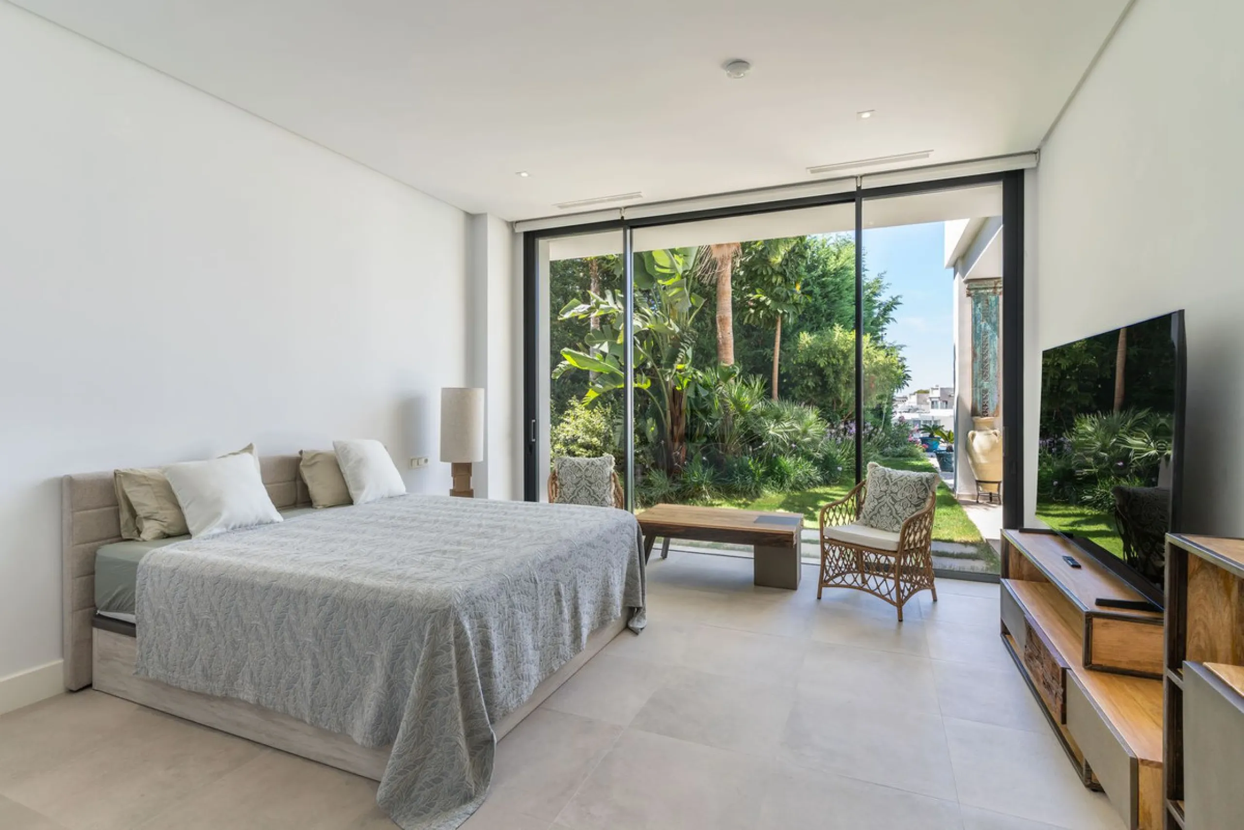 This exceptional luxury villa is situated in the prestigious area of Cabopino, Marbella East, offering a prime front line golf location with captivating views of both the sea and lush fairways. Designed to the highest standards, the property spans a gener