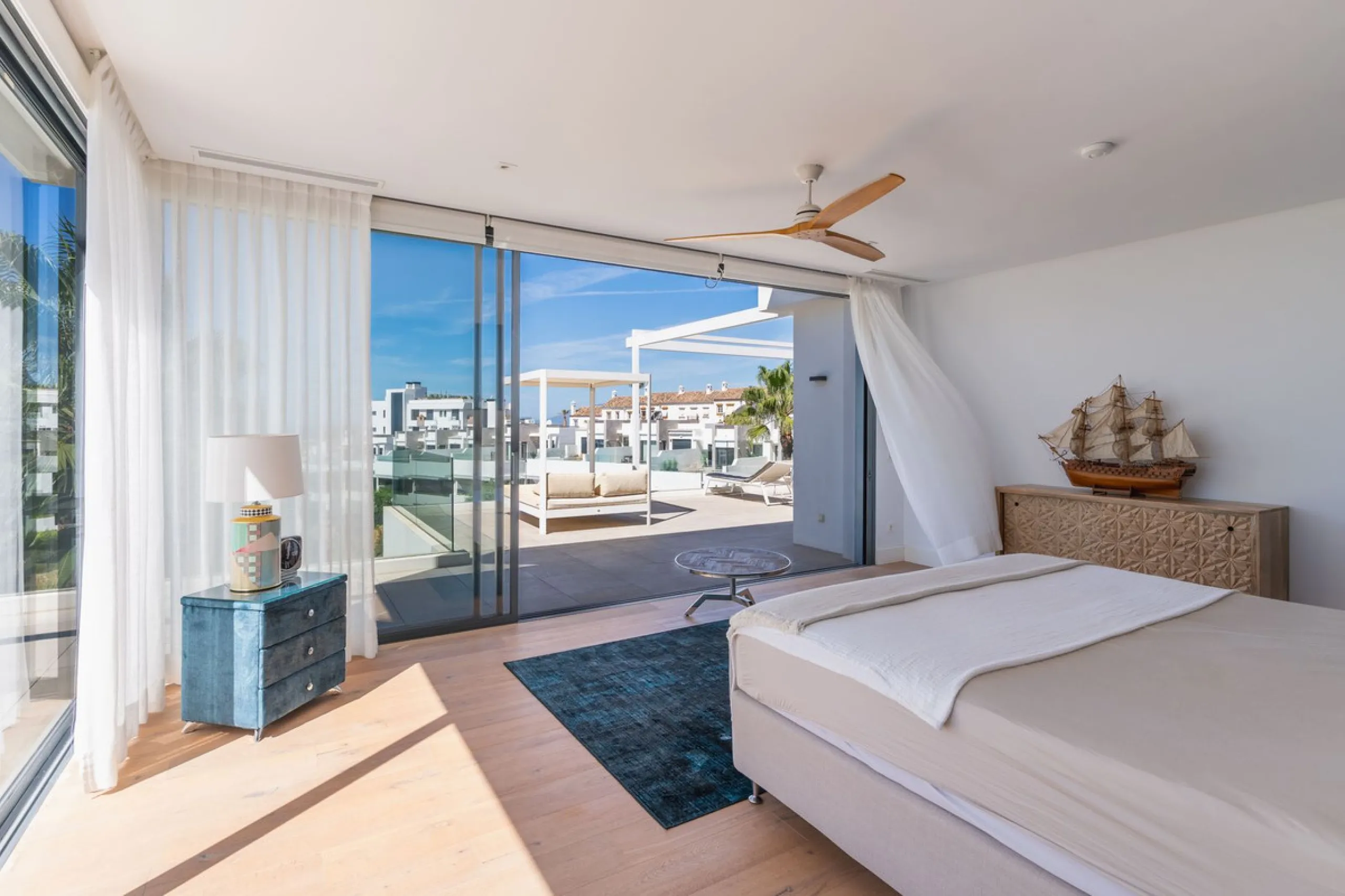 This exceptional luxury villa is situated in the prestigious area of Cabopino, Marbella East, offering a prime front line golf location with captivating views of both the sea and lush fairways. Designed to the highest standards, the property spans a gener