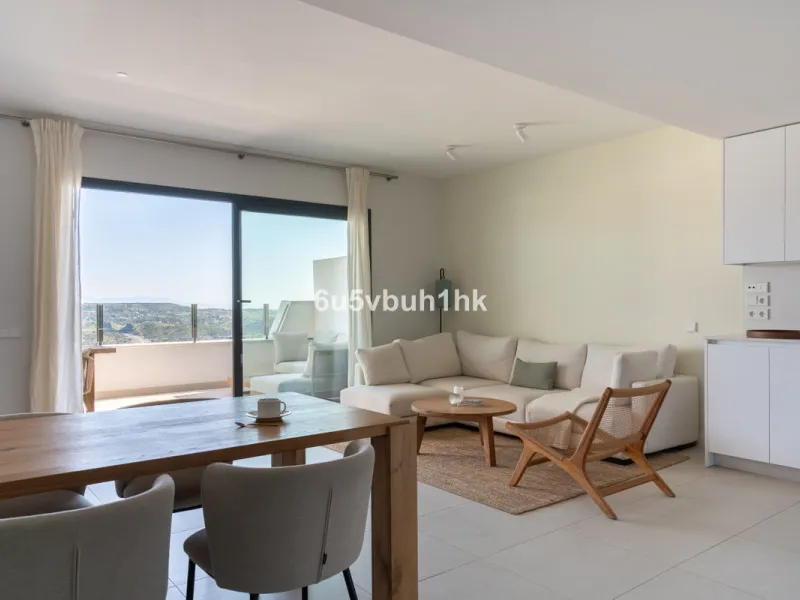 Nestled in the exclusive La Cala Nova Golf community, this brand-new, fully furnished two-bedroom, two-bathroom apartment offers breathtaking golf and mountain views. The spacious layout features a large open terrace and a sleek open kitchen, perfect for 