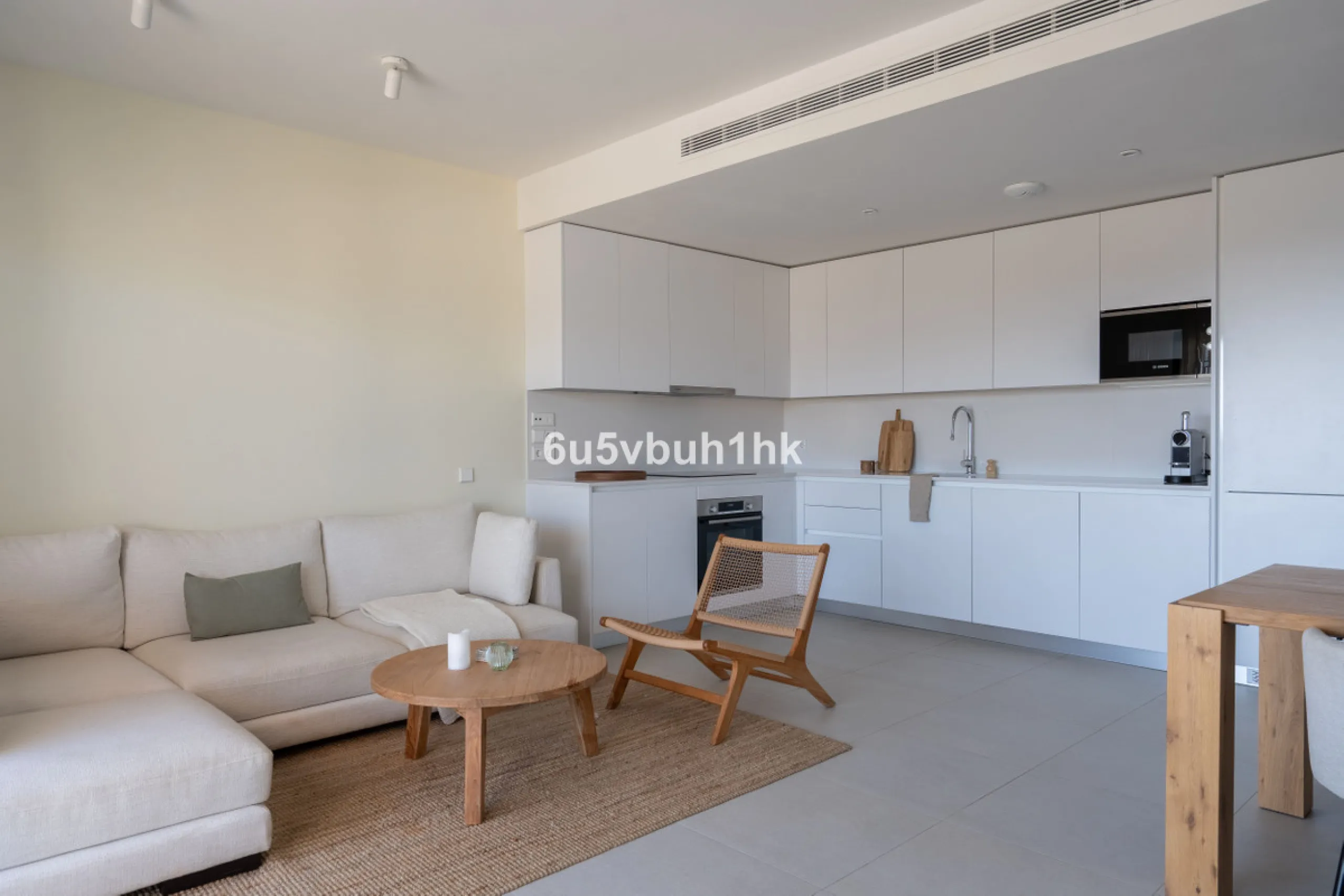 Nestled in the exclusive La Cala Nova Golf community, this brand-new, fully furnished two-bedroom, two-bathroom apartment offers breathtaking golf and mountain views. The spacious layout features a large open terrace and a sleek open kitchen, perfect for 