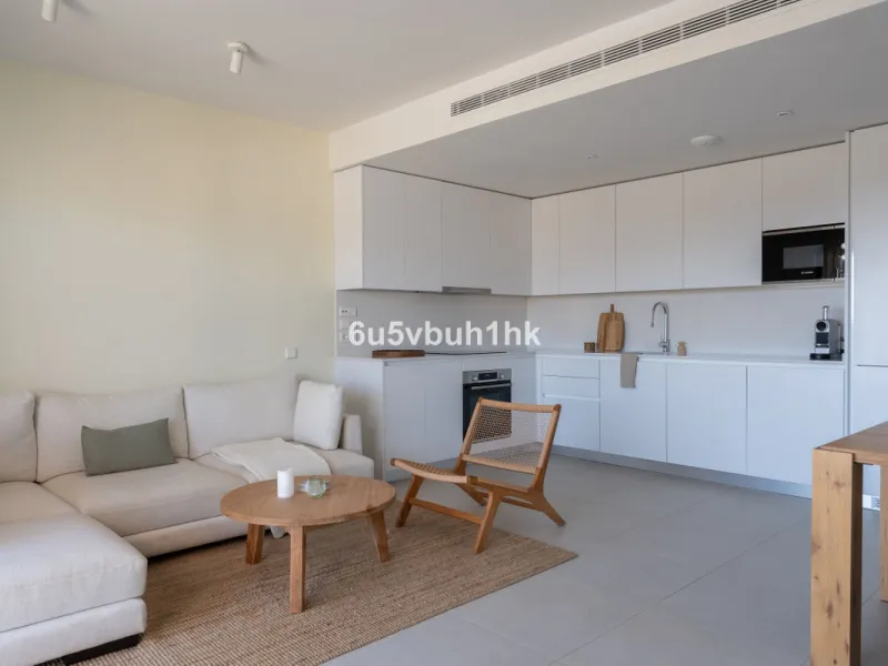 Nestled in the exclusive La Cala Nova Golf community, this brand-new, fully furnished two-bedroom, two-bathroom apartment offers breathtaking golf and mountain views. The spacious layout features a large open terrace and a sleek open kitchen, perfect for 