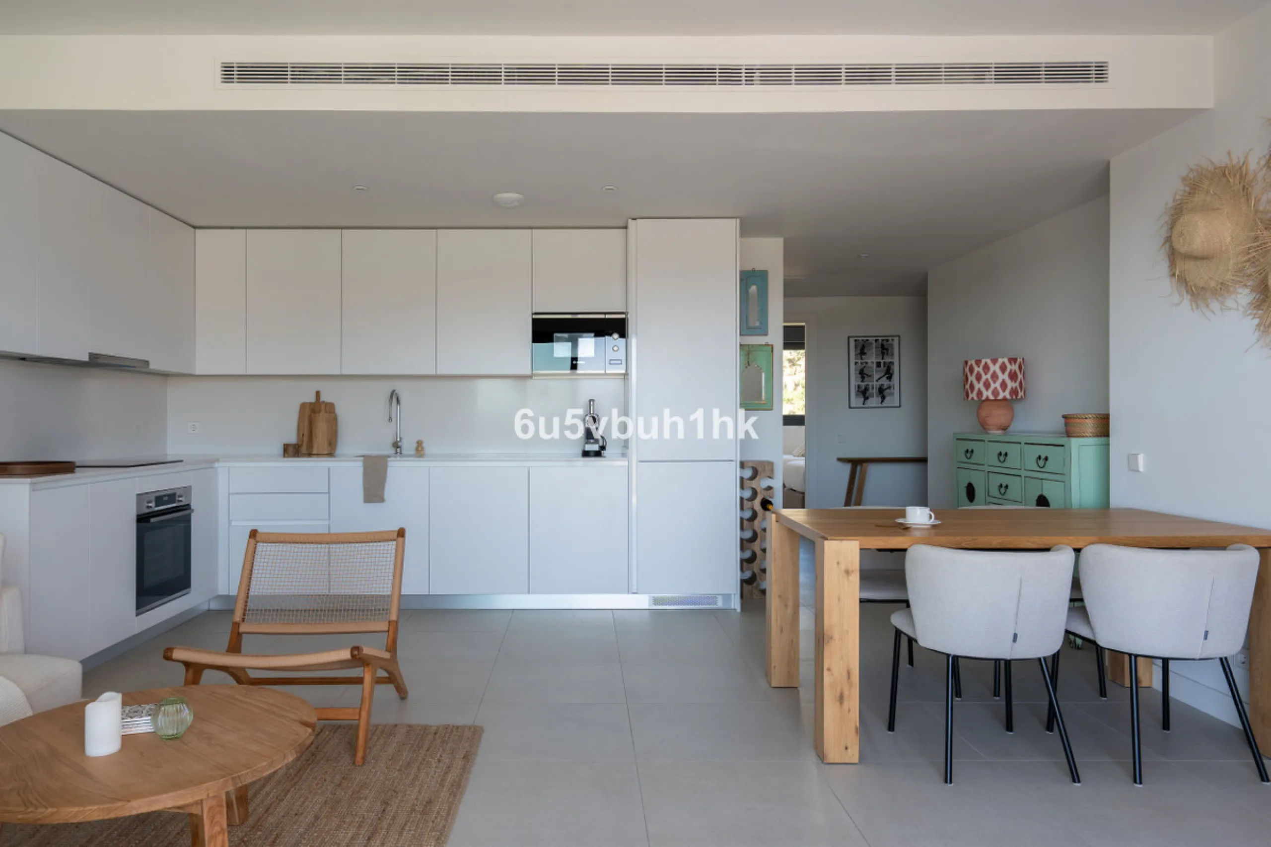 Nestled in the exclusive La Cala Nova Golf community, this brand-new, fully furnished two-bedroom, two-bathroom apartment offers breathtaking golf and mountain views. The spacious layout features a large open terrace and a sleek open kitchen, perfect for 