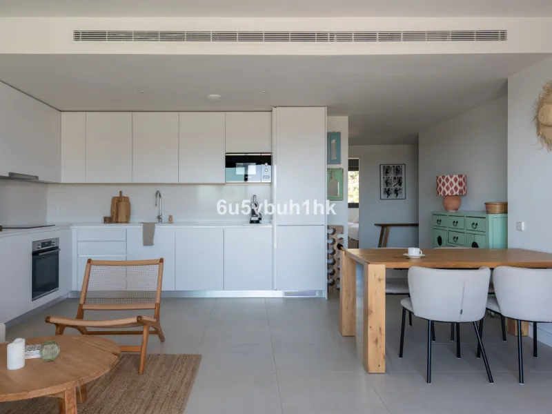 Nestled in the exclusive La Cala Nova Golf community, this brand-new, fully furnished two-bedroom, two-bathroom apartment offers breathtaking golf and mountain views. The spacious layout features a large open terrace and a sleek open kitchen, perfect for 