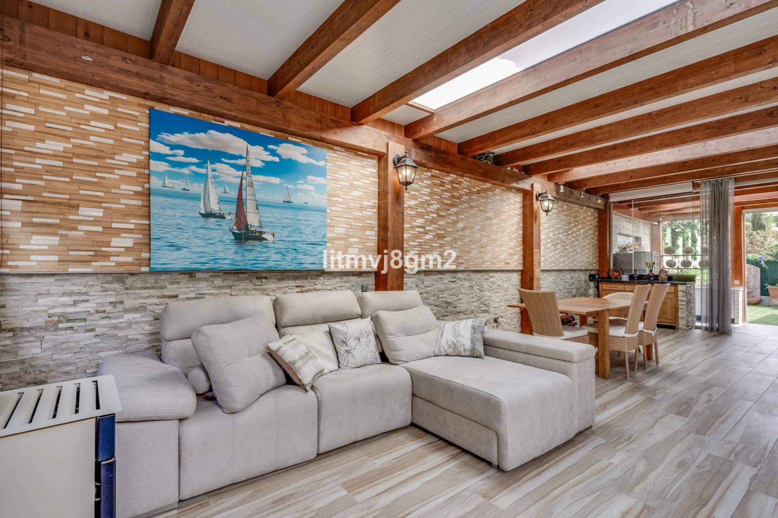 This luxurious four-bedroom villa, located in the peaceful area of lower Artola / Hacienda Las Chapas, just 5 minuntes walk to the sea, is the epitome of elegance and comfort. Boasting a classic design with high-end finishes, the property features an abun