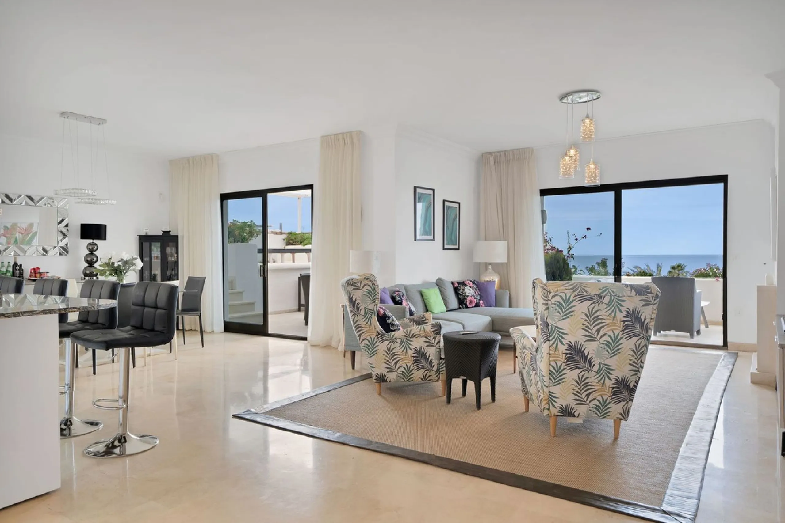 This luxurious penthouse, located on Marbella's prestigious Golden Mile in the Coral Beach complex, epitomizes beachfront living. The property features three spacious bedrooms and two elegant bathrooms, providing ample comfort and privacy. The highlight i