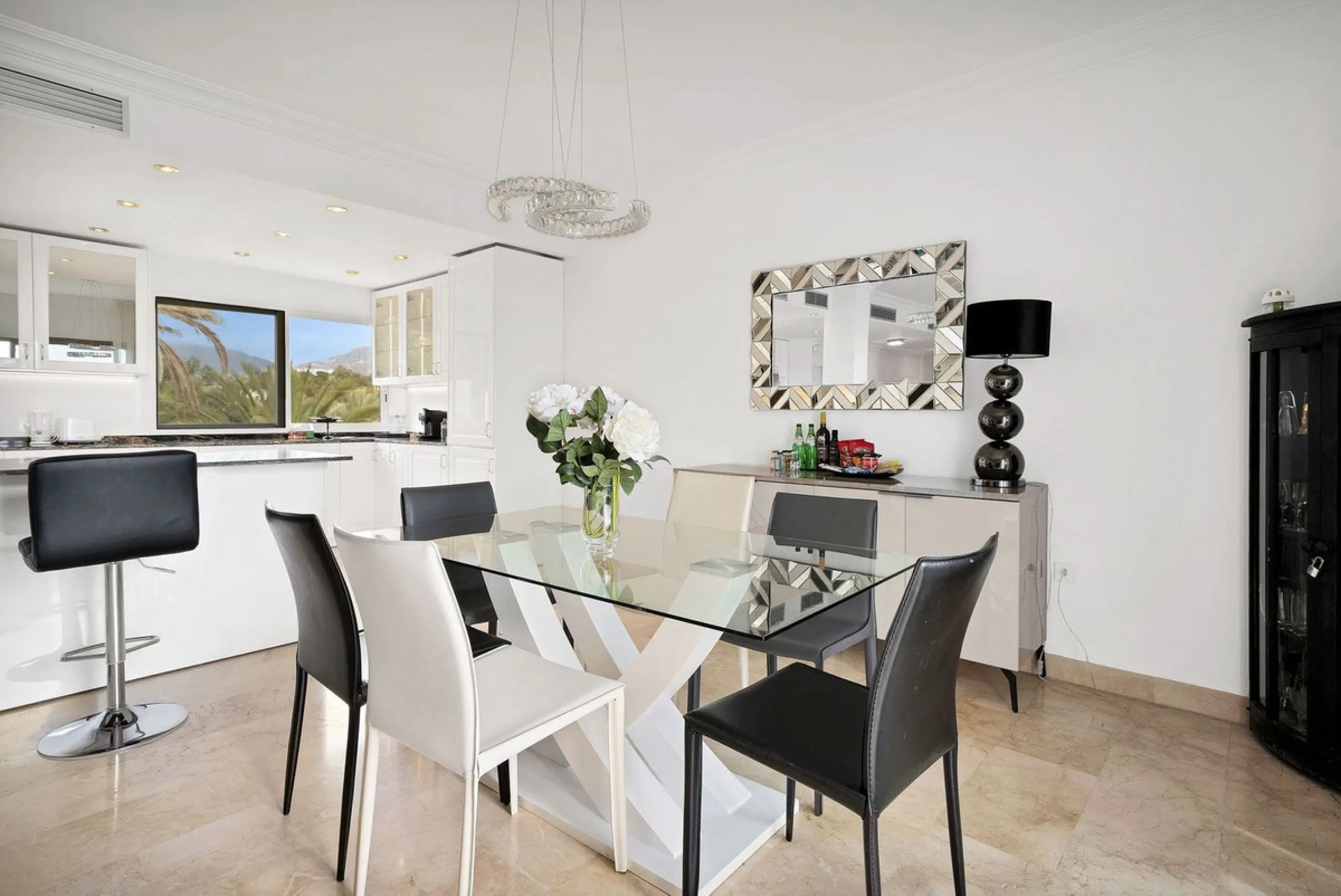 This luxurious penthouse, located on Marbella's prestigious Golden Mile in the Coral Beach complex, epitomizes beachfront living. The property features three spacious bedrooms and two elegant bathrooms, providing ample comfort and privacy. The highlight i