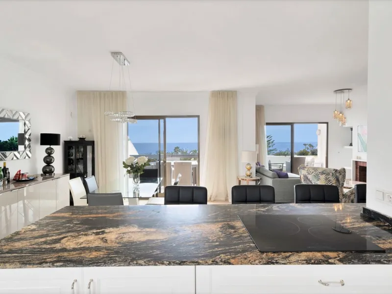 This luxurious penthouse, located on Marbella's prestigious Golden Mile in the Coral Beach complex, epitomizes beachfront living. The property features three spacious bedrooms and two elegant bathrooms, providing ample comfort and privacy. The highlight i