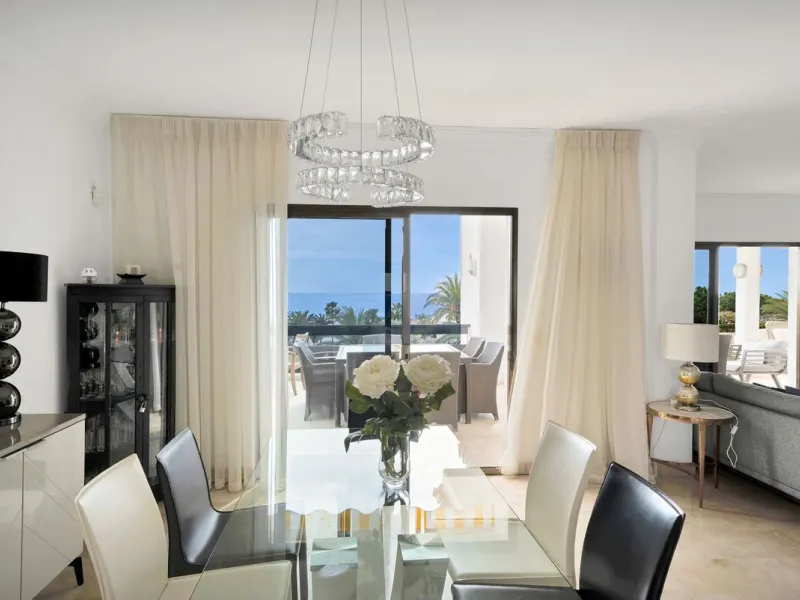 This luxurious penthouse, located on Marbella's prestigious Golden Mile in the Coral Beach complex, epitomizes beachfront living. The property features three spacious bedrooms and two elegant bathrooms, providing ample comfort and privacy. The highlight i