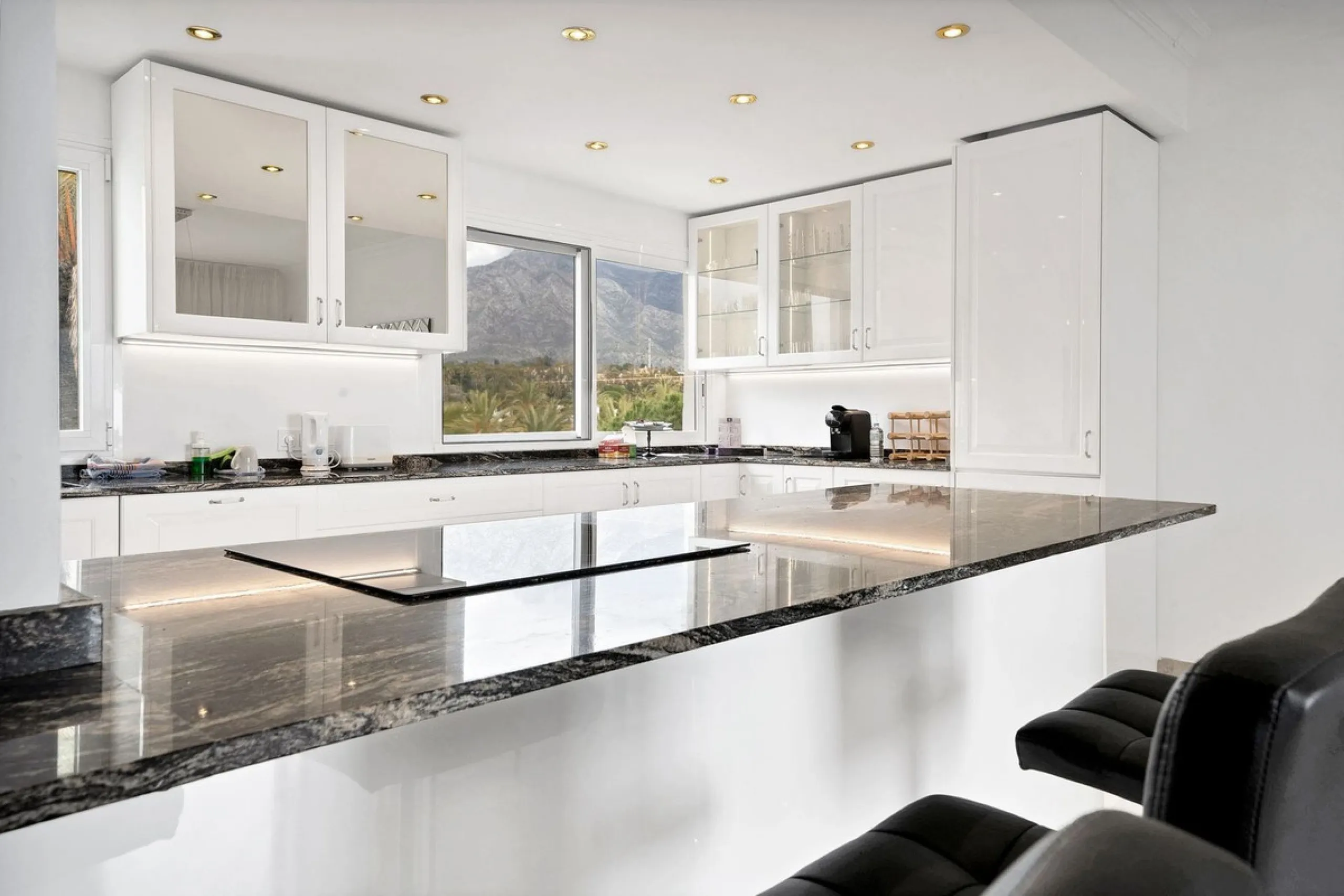 This luxurious penthouse, located on Marbella's prestigious Golden Mile in the Coral Beach complex, epitomizes beachfront living. The property features three spacious bedrooms and two elegant bathrooms, providing ample comfort and privacy. The highlight i