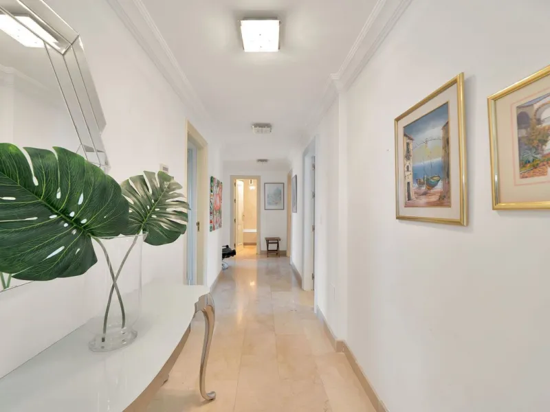 This luxurious penthouse, located on Marbella's prestigious Golden Mile in the Coral Beach complex, epitomizes beachfront living. The property features three spacious bedrooms and two elegant bathrooms, providing ample comfort and privacy. The highlight i