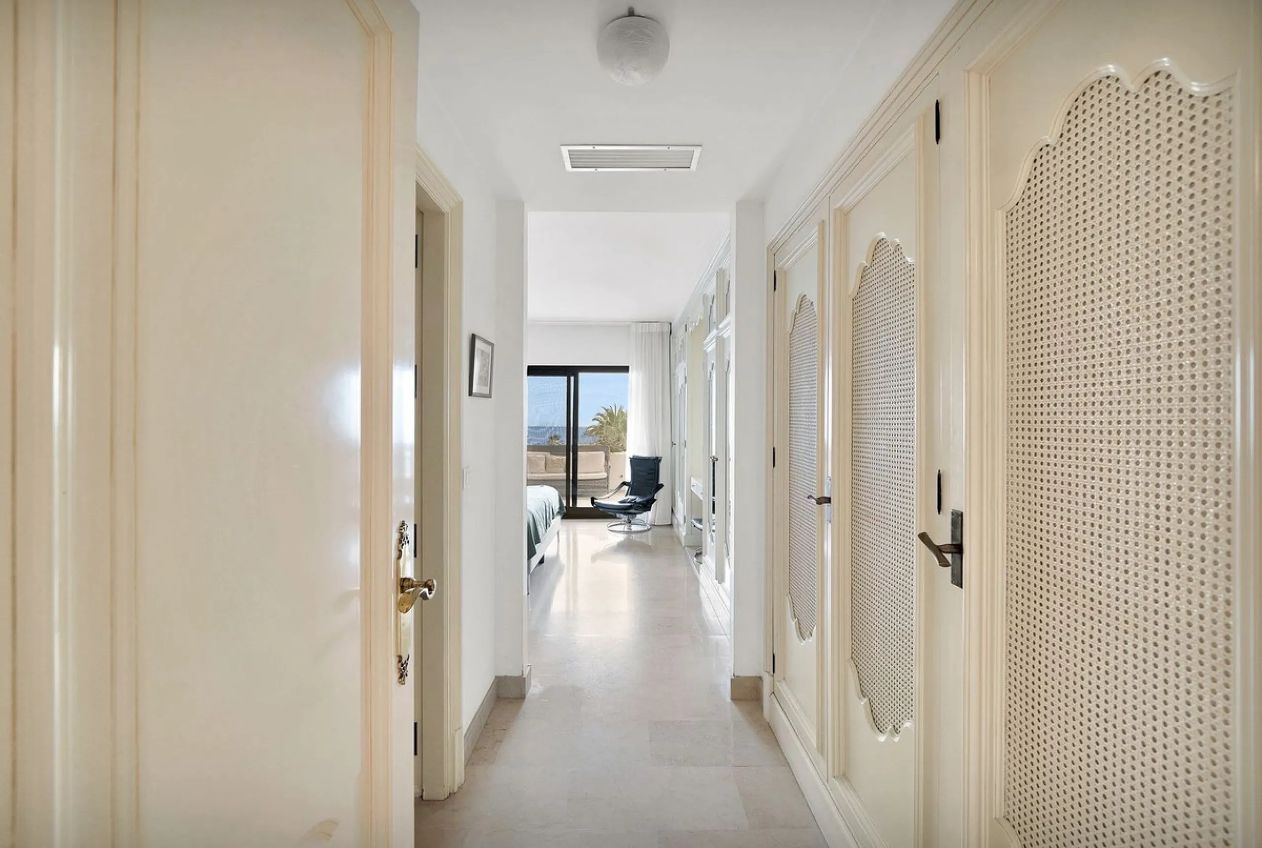 This luxurious penthouse, located on Marbella's prestigious Golden Mile in the Coral Beach complex, epitomizes beachfront living. The property features three spacious bedrooms and two elegant bathrooms, providing ample comfort and privacy. The highlight i