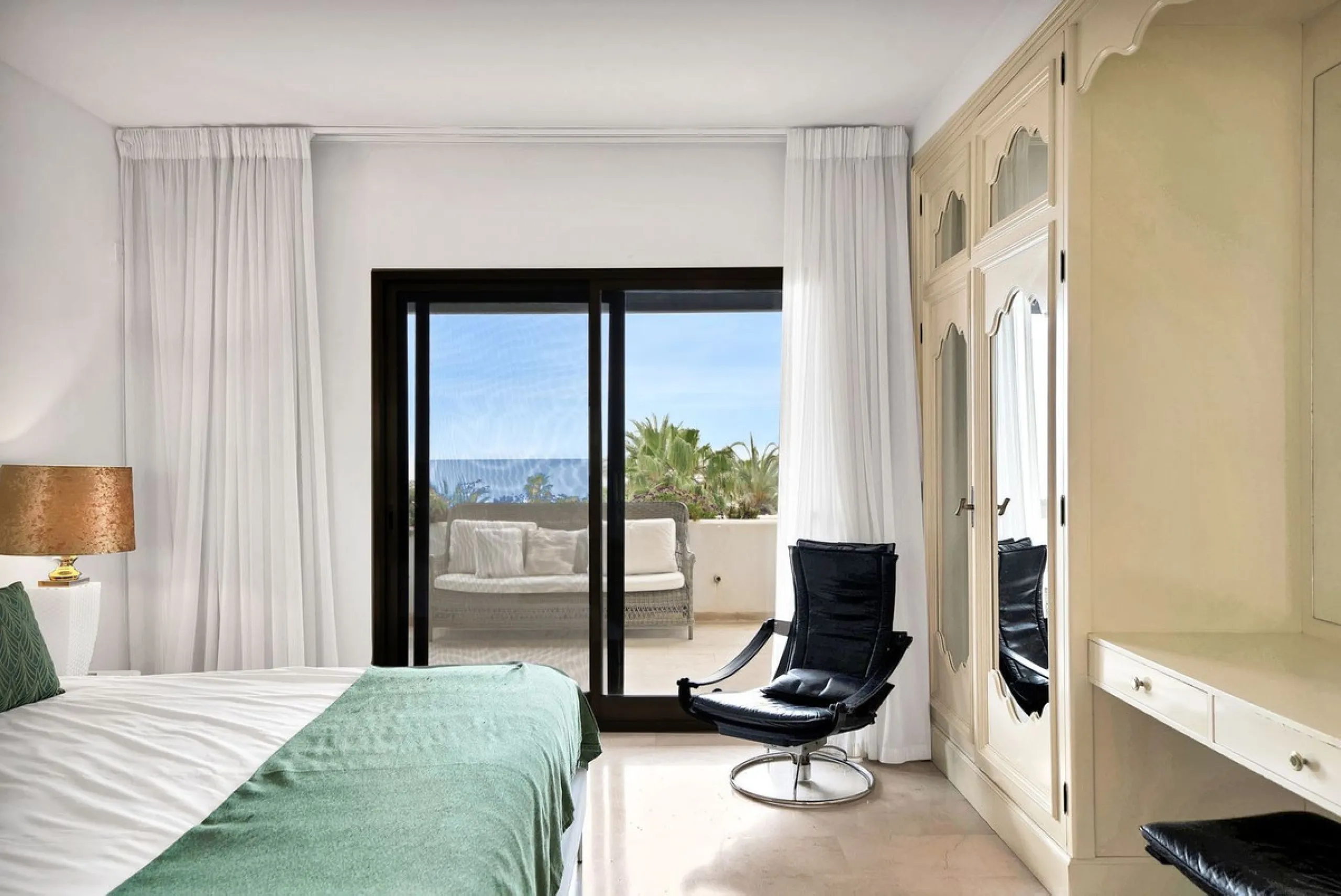 This luxurious penthouse, located on Marbella's prestigious Golden Mile in the Coral Beach complex, epitomizes beachfront living. The property features three spacious bedrooms and two elegant bathrooms, providing ample comfort and privacy. The highlight i