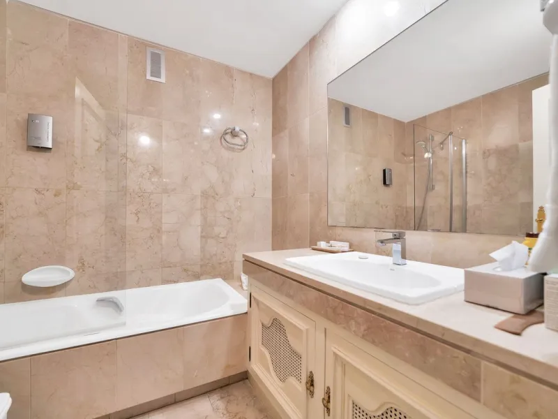 This luxurious penthouse, located on Marbella's prestigious Golden Mile in the Coral Beach complex, epitomizes beachfront living. The property features three spacious bedrooms and two elegant bathrooms, providing ample comfort and privacy. The highlight i