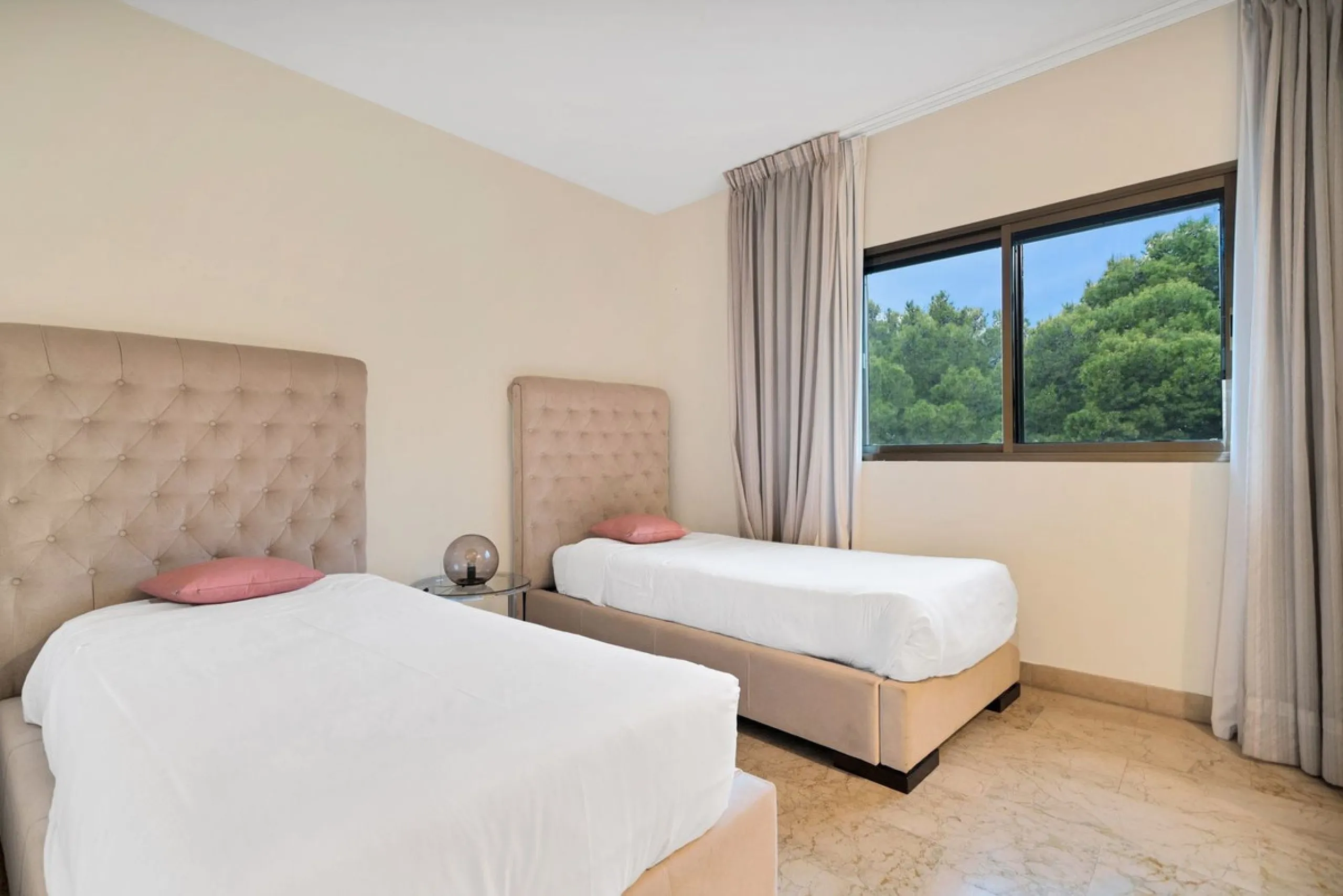 This luxurious penthouse, located on Marbella's prestigious Golden Mile in the Coral Beach complex, epitomizes beachfront living. The property features three spacious bedrooms and two elegant bathrooms, providing ample comfort and privacy. The highlight i