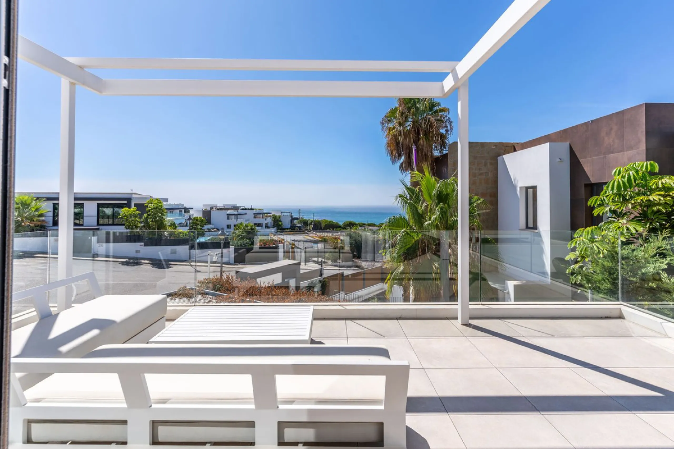 This exceptional luxury villa is situated in the prestigious area of Cabopino, Marbella East, offering a prime front line golf location with captivating views of both the sea and lush fairways. Designed to the highest standards, the property spans a gener