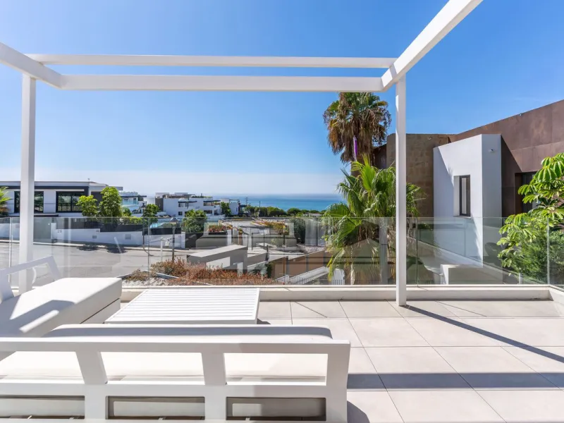 This exceptional luxury villa is situated in the prestigious area of Cabopino, Marbella East, offering a prime front line golf location with captivating views of both the sea and lush fairways. Designed to the highest standards, the property spans a gener