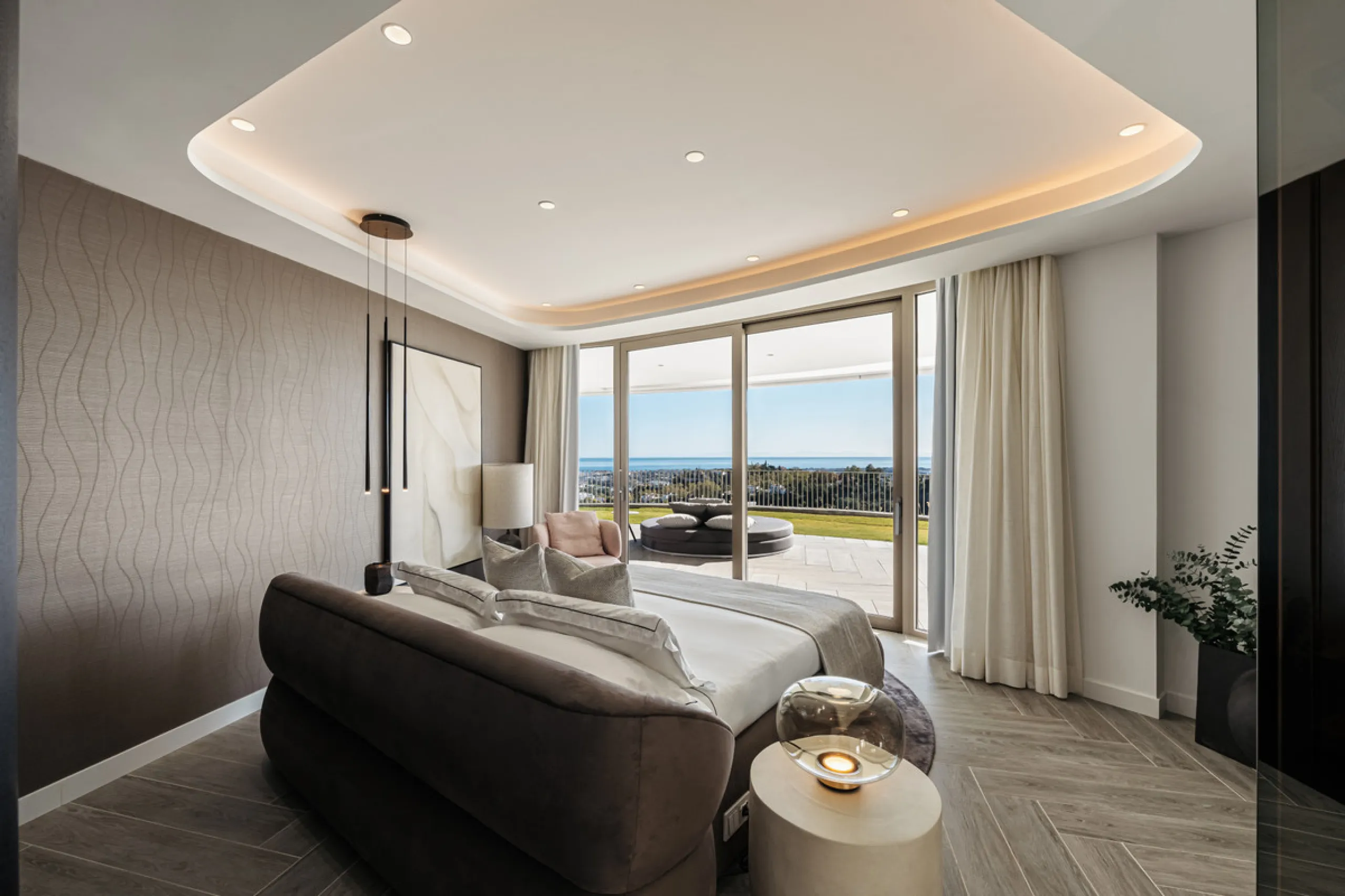 Discover this modern 3-bedroom ground floor apartment in a new eco-friendly development in Benahavís, offering panoramic sea views. Situated within a gated resort-style community surrounded by lush landscaped gardens, this apartment embodies contemporary 