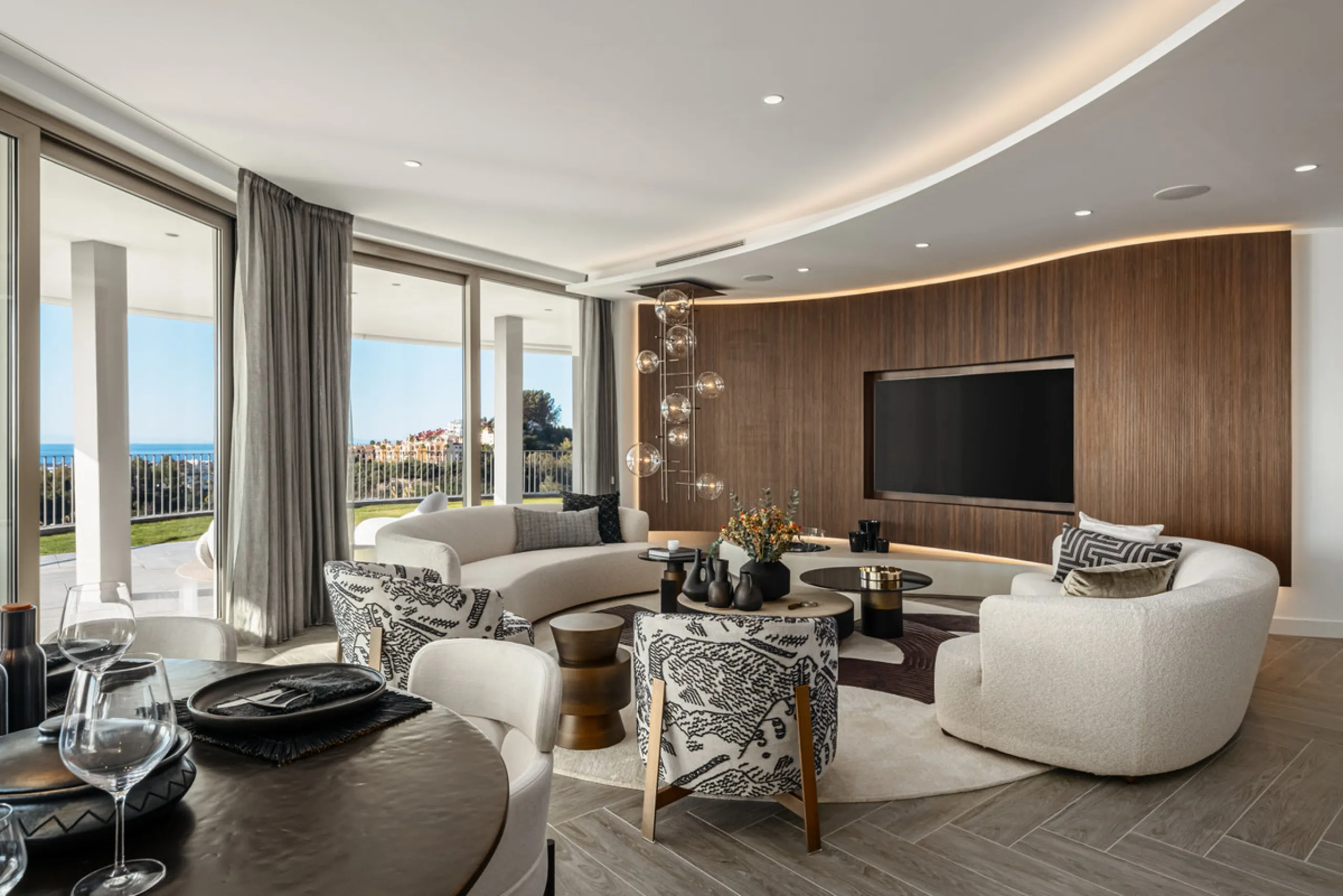 Discover this modern 3-bedroom ground floor apartment in a new eco-friendly development in Benahavís, offering panoramic sea views. Situated within a gated resort-style community surrounded by lush landscaped gardens, this apartment embodies contemporary 