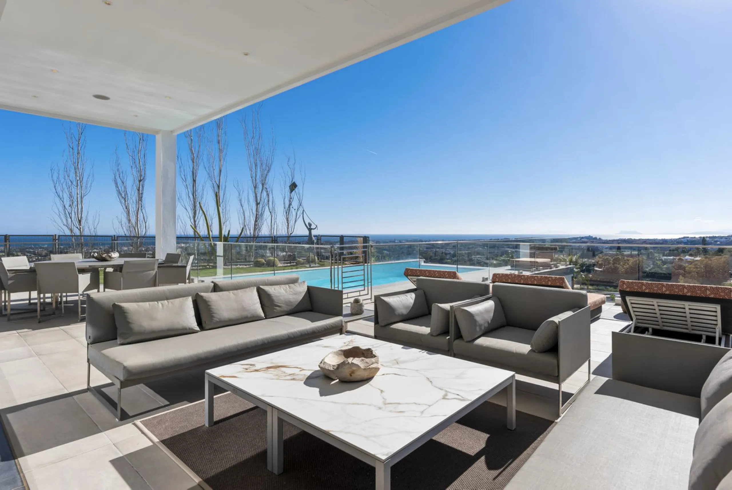 This property stands out as a true gem among modern, luxurious villas, gracefully placed in the exclusive gated community of El Herrojo in the esteemed locale of La Quinta. Elegantly perched atop a captivating hill, this exquisite residence offers a capti