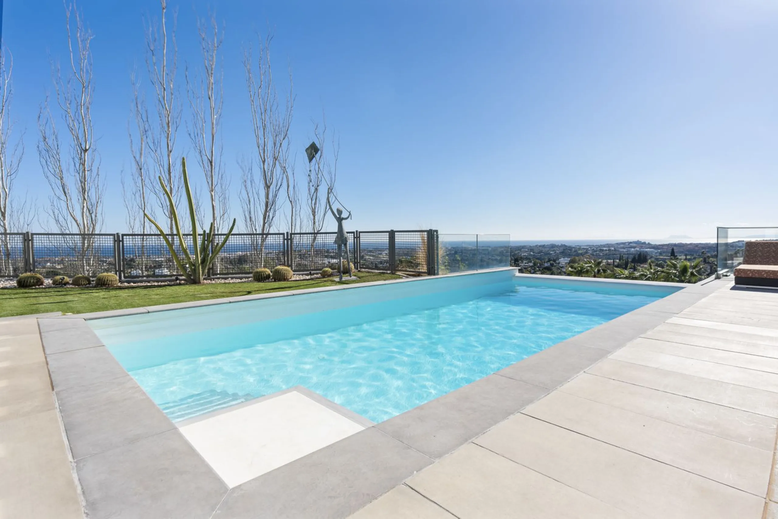 This property stands out as a true gem among modern, luxurious villas, gracefully placed in the exclusive gated community of El Herrojo in the esteemed locale of La Quinta. Elegantly perched atop a captivating hill, this exquisite residence offers a capti