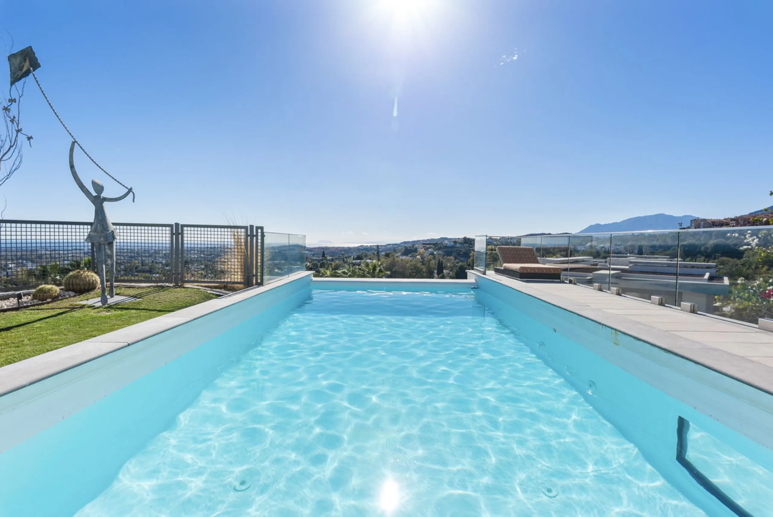 This property stands out as a true gem among modern, luxurious villas, gracefully placed in the exclusive gated community of El Herrojo in the esteemed locale of La Quinta. Elegantly perched atop a captivating hill, this exquisite residence offers a capti