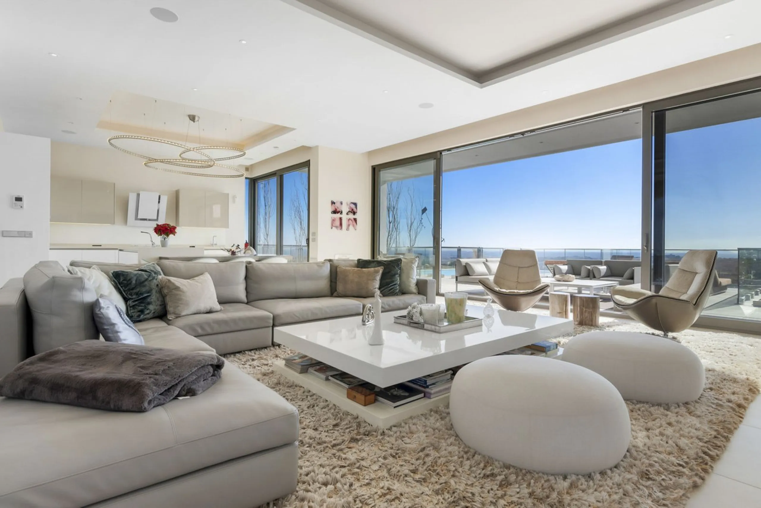 This property stands out as a true gem among modern, luxurious villas, gracefully placed in the exclusive gated community of El Herrojo in the esteemed locale of La Quinta. Elegantly perched atop a captivating hill, this exquisite residence offers a capti
