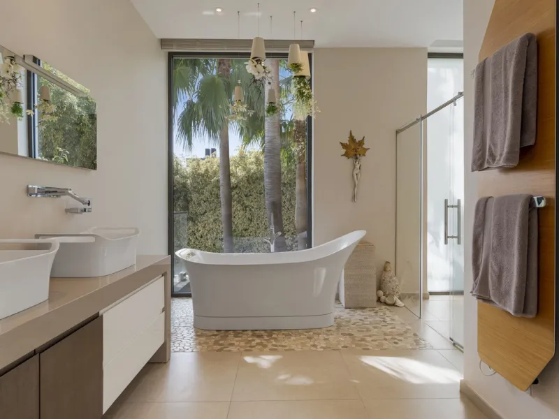 This property stands out as a true gem among modern, luxurious villas, gracefully placed in the exclusive gated community of El Herrojo in the esteemed locale of La Quinta. Elegantly perched atop a captivating hill, this exquisite residence offers a capti