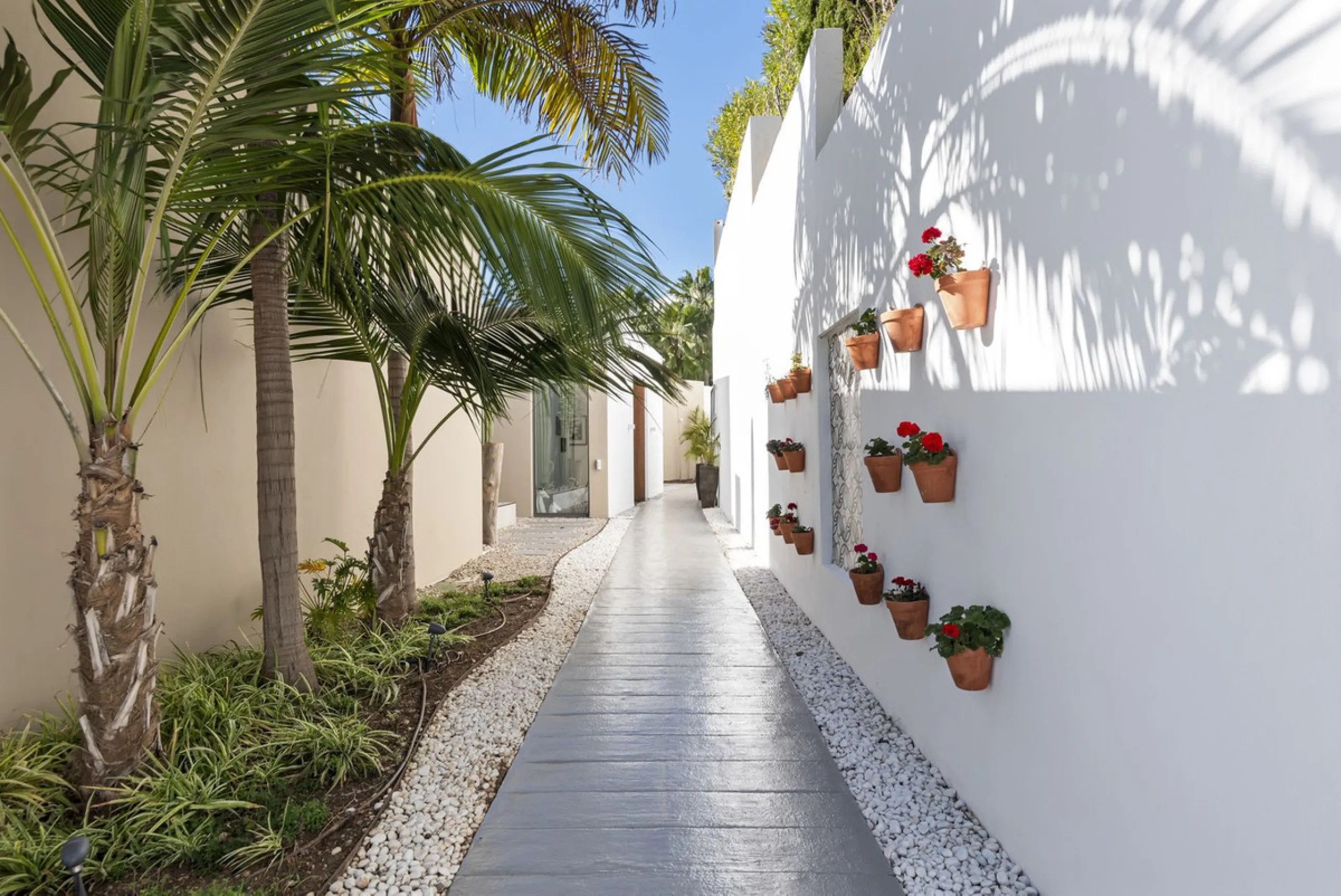 This property stands out as a true gem among modern, luxurious villas, gracefully placed in the exclusive gated community of El Herrojo in the esteemed locale of La Quinta. Elegantly perched atop a captivating hill, this exquisite residence offers a capti